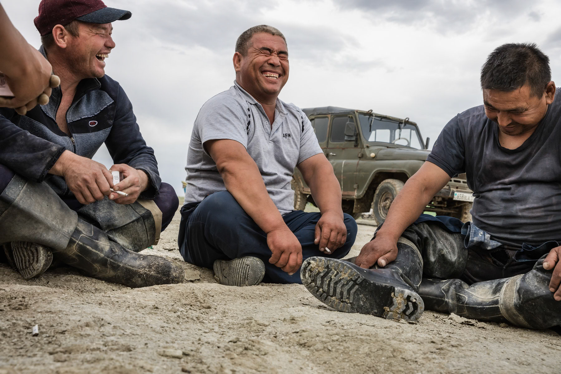 Fishermen waiting for sunset before going at Sea. Tastubek, Aral Sea, Kazakhstan, June 2019