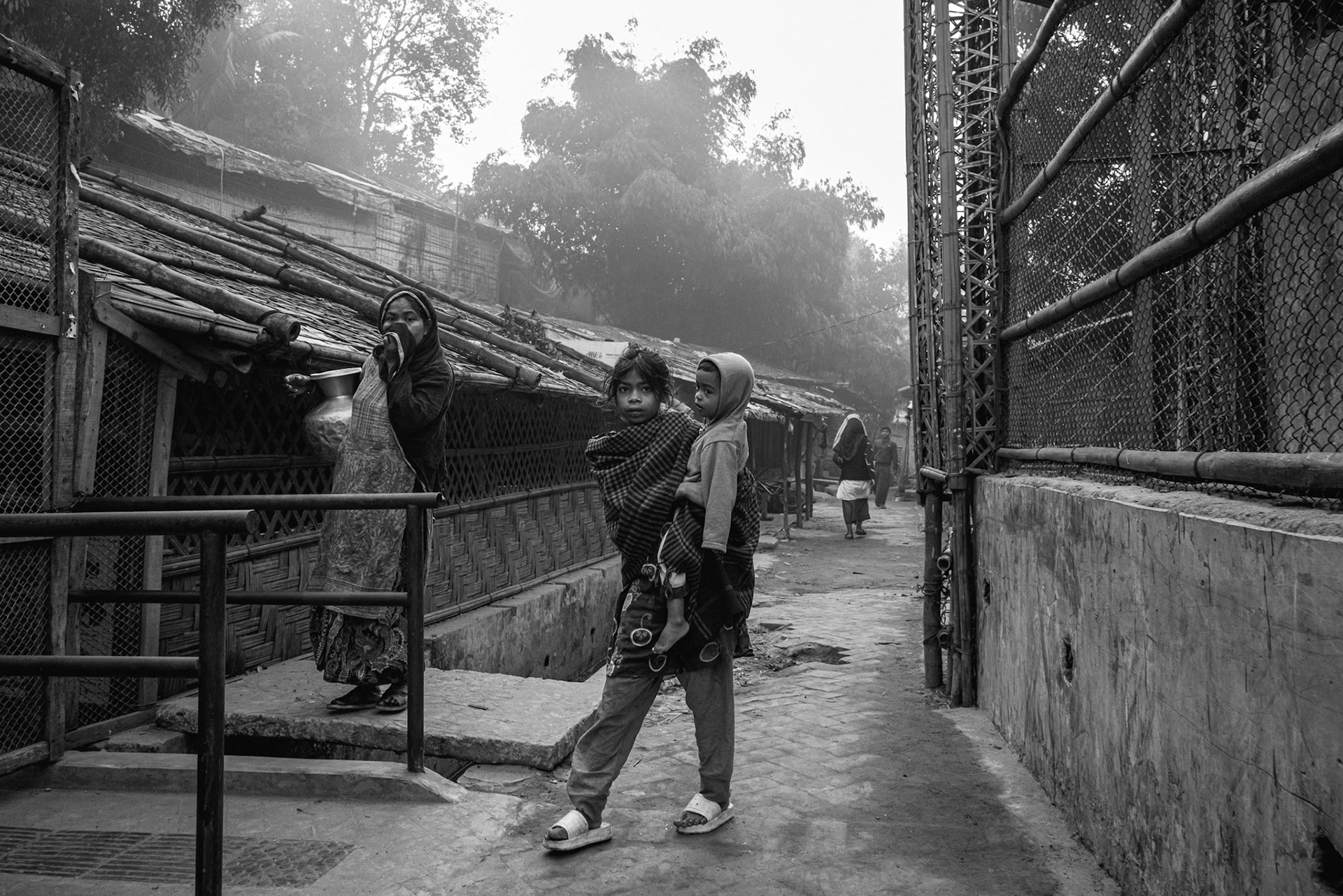 The presence of fencing underscores the restricted nature of the camps, where refugees are generally not permitted to leave the designated areas. Balukhali camp, Bangladesh, January 2026