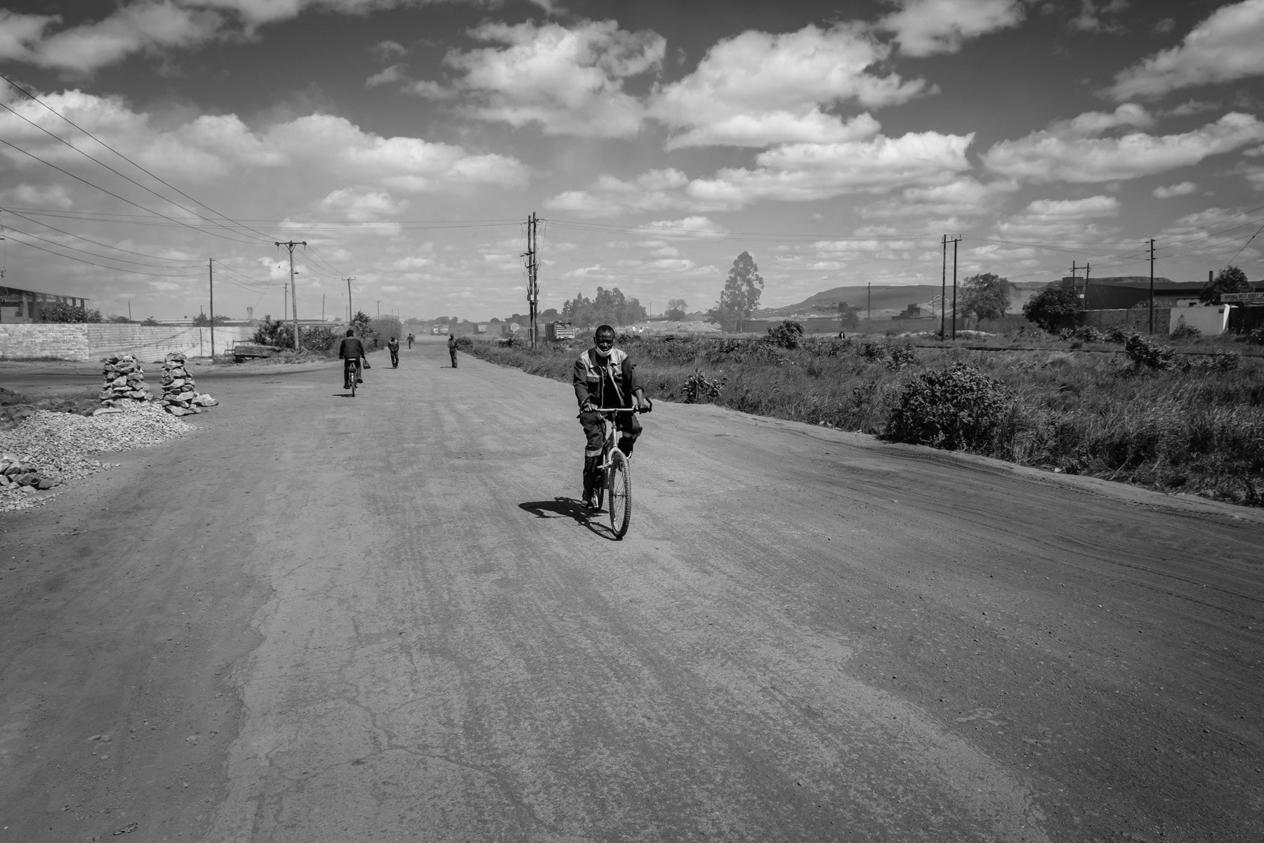 Miner in the Broken Hill mine area. Despite being closed in 1994, the lead and zinc mine area is still being mined through regulated and unregulated small scale mining operations. Kabwe, Zambia, May 2021