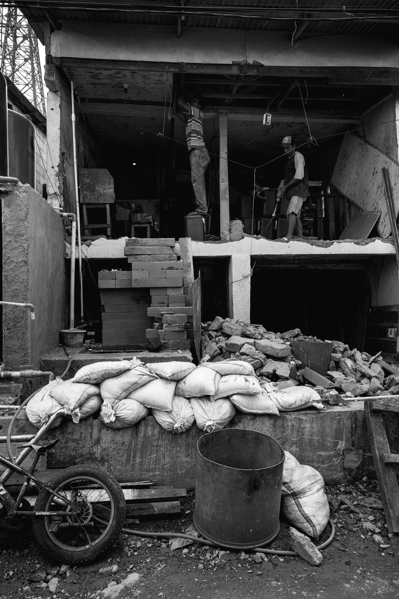 Vertical struggle: Residents are forced to constantly raise their floors and rebuild as the land beneath them subsides. Jakarta, January 2026