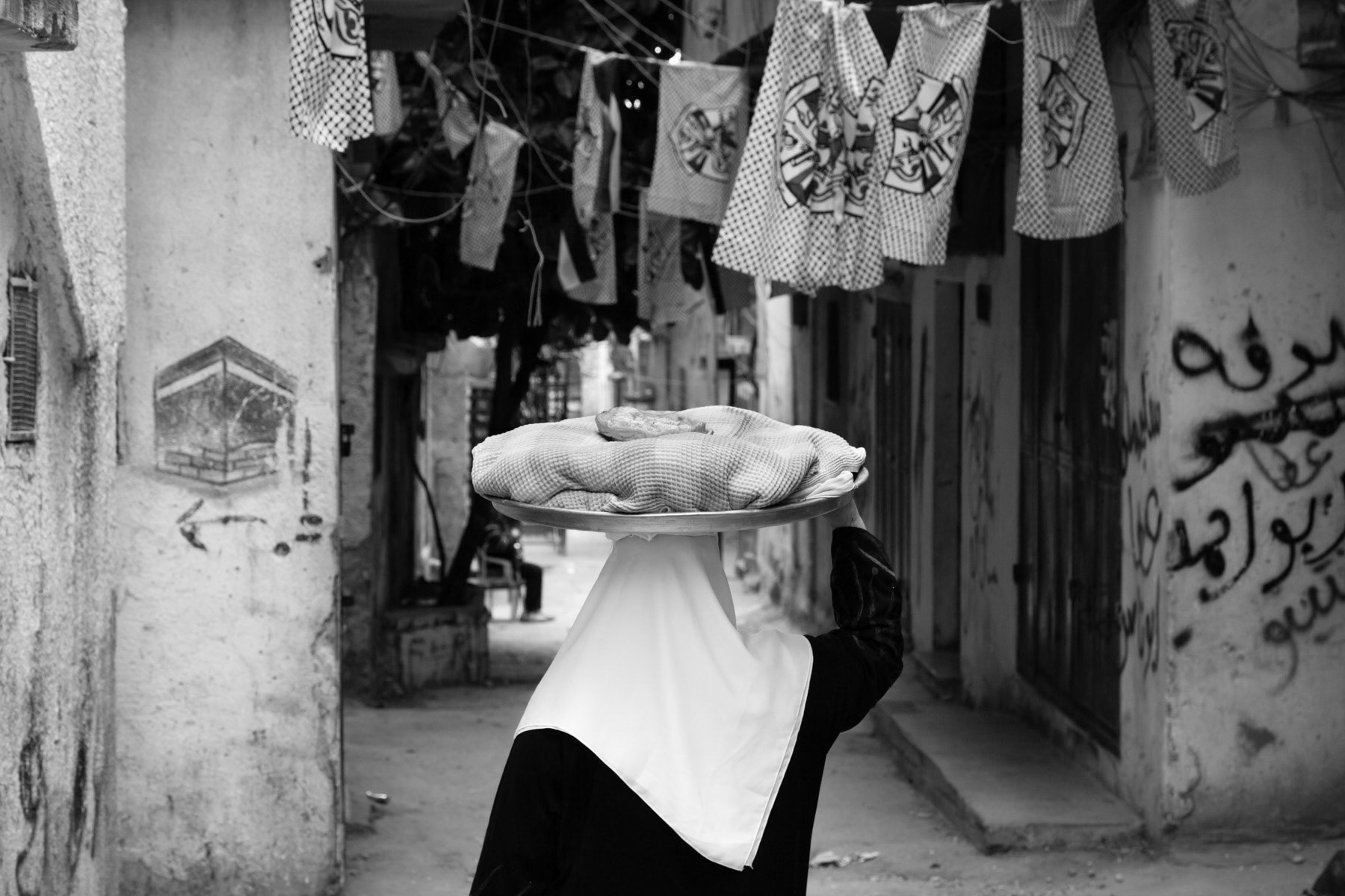Fresh bread delivery, Balata Camp in the West Bank, May 2014