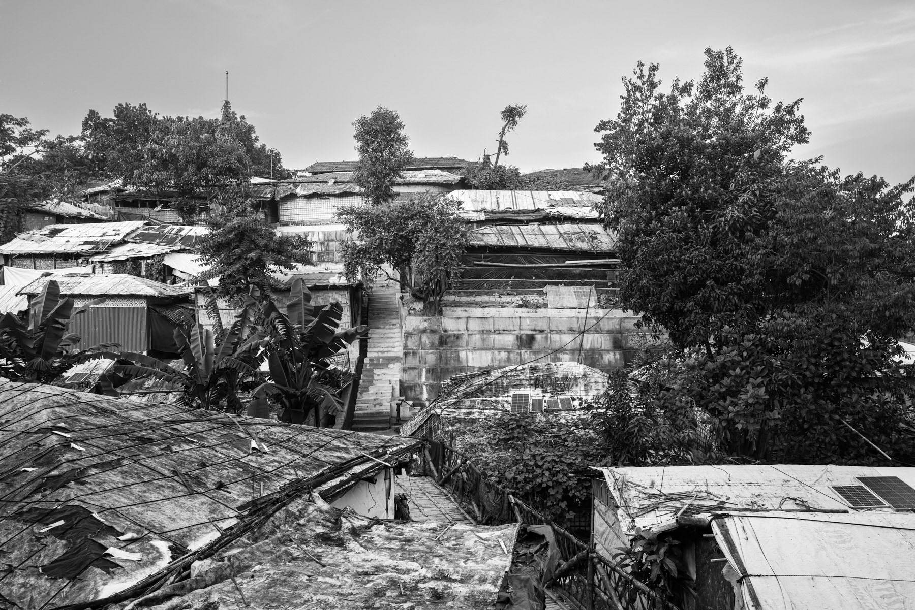 Makeshift shelters stretch across Kutupalong camp, providing temporary refuge for Rohingya families fleeing violence in Rakhine, with approximately 150,000 new arrivals since early 2024. Kutupalong refugee camp, Cox's Bazar, Bangladesh, September 2025