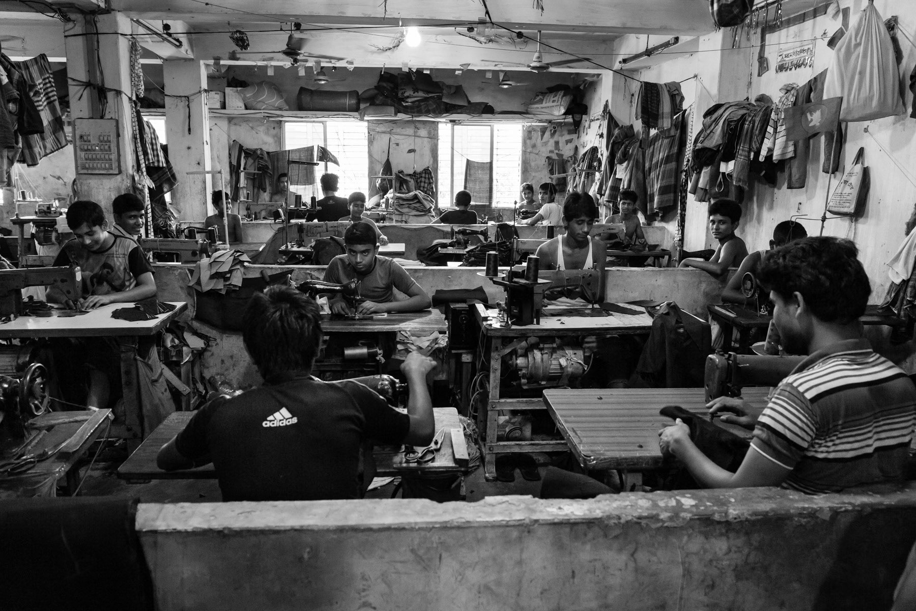 Garment workers producing pants in fourteen hours shifts, Dhaka, Bangladesh, May 2015