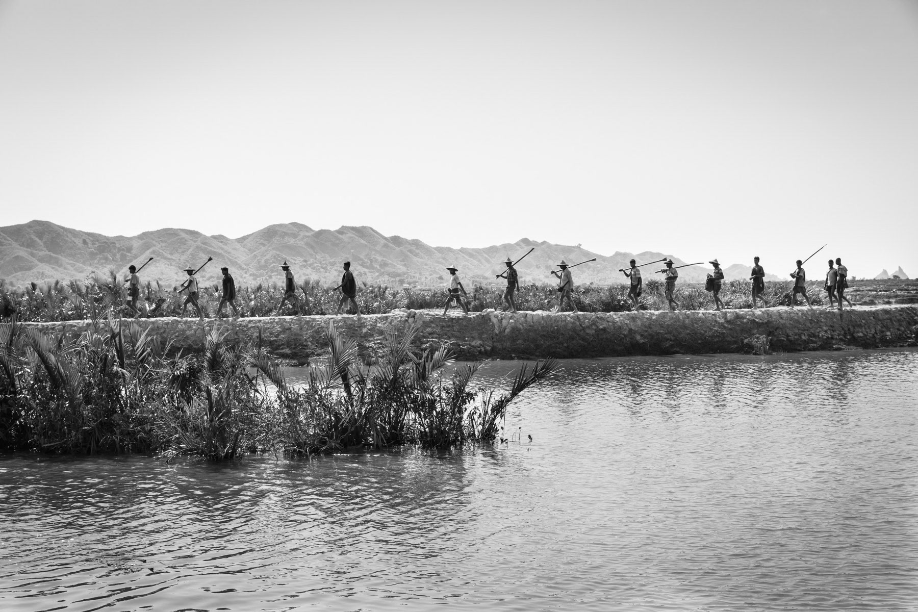 Rohingya villagers returning from the fields, Paktauw township in Rakhine, Myanmar, May 2017