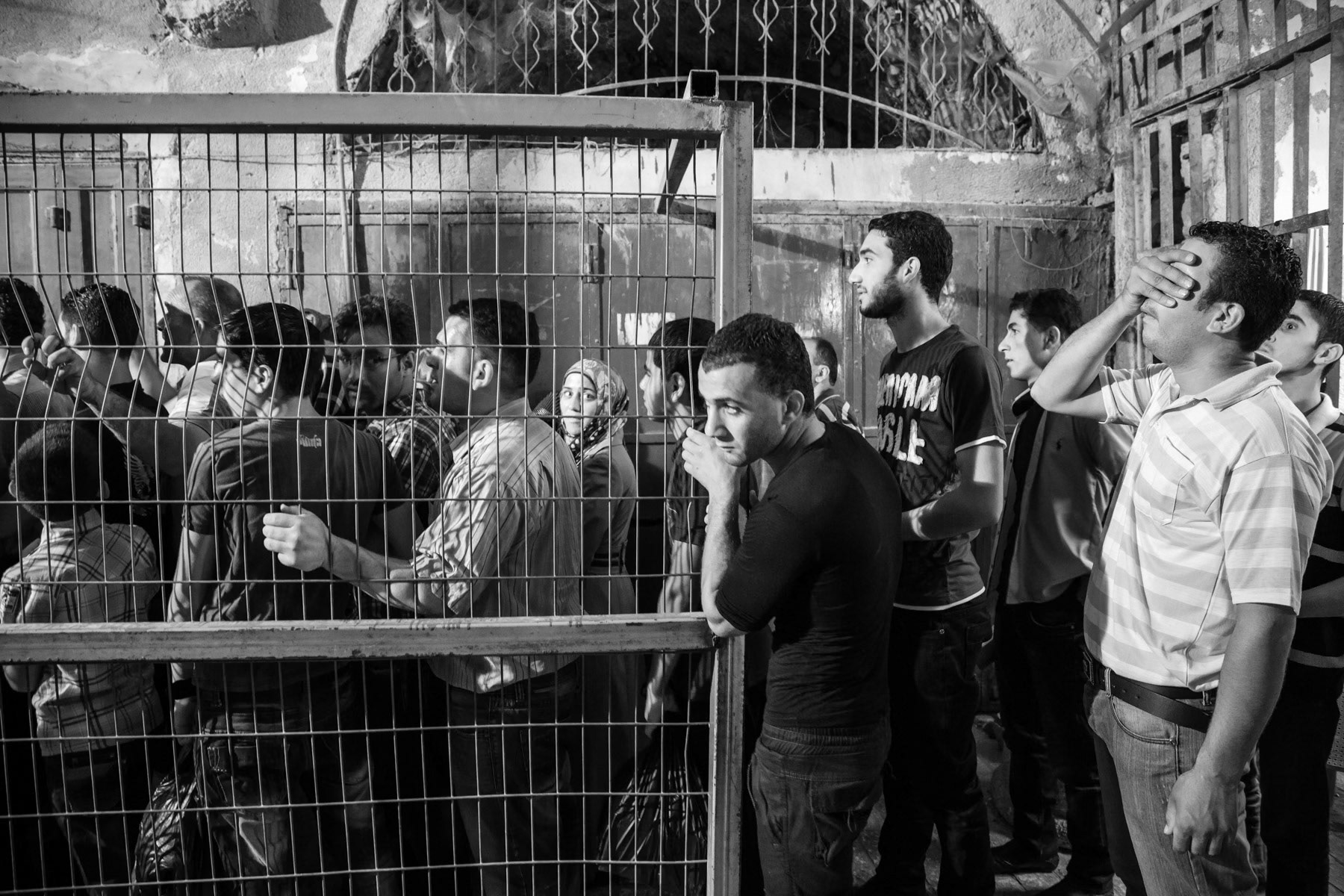 Waiting to pass one of the numereous Israeli army check-points in Hebron, Palestine, August 2013
