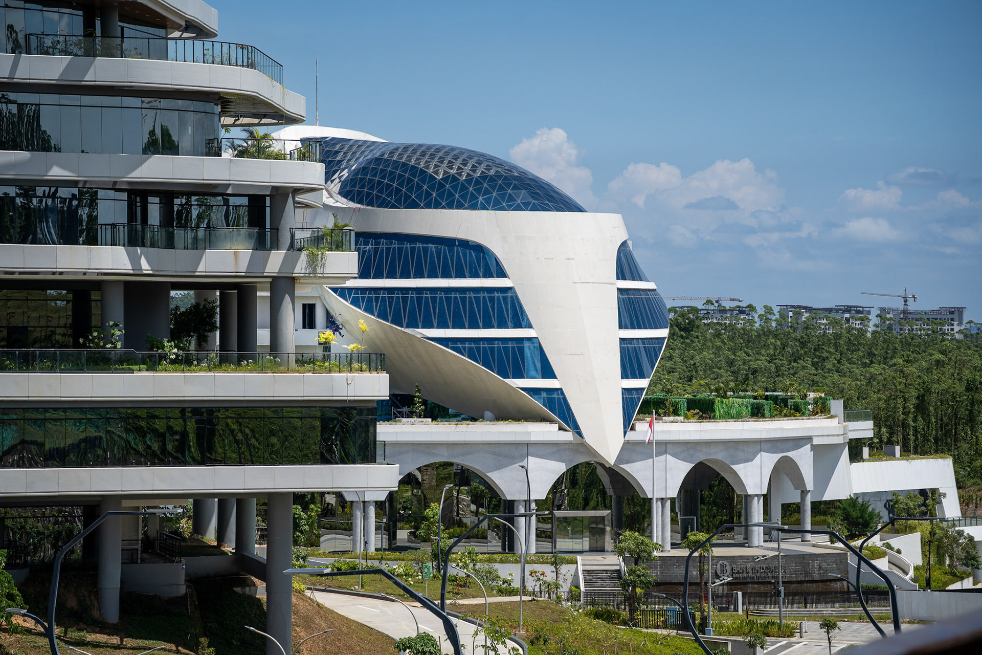 Futuristic silhouettes that feel like relics of a previous political era. Ibu Kota Nusantara (IKN), Indonesia, January 2026