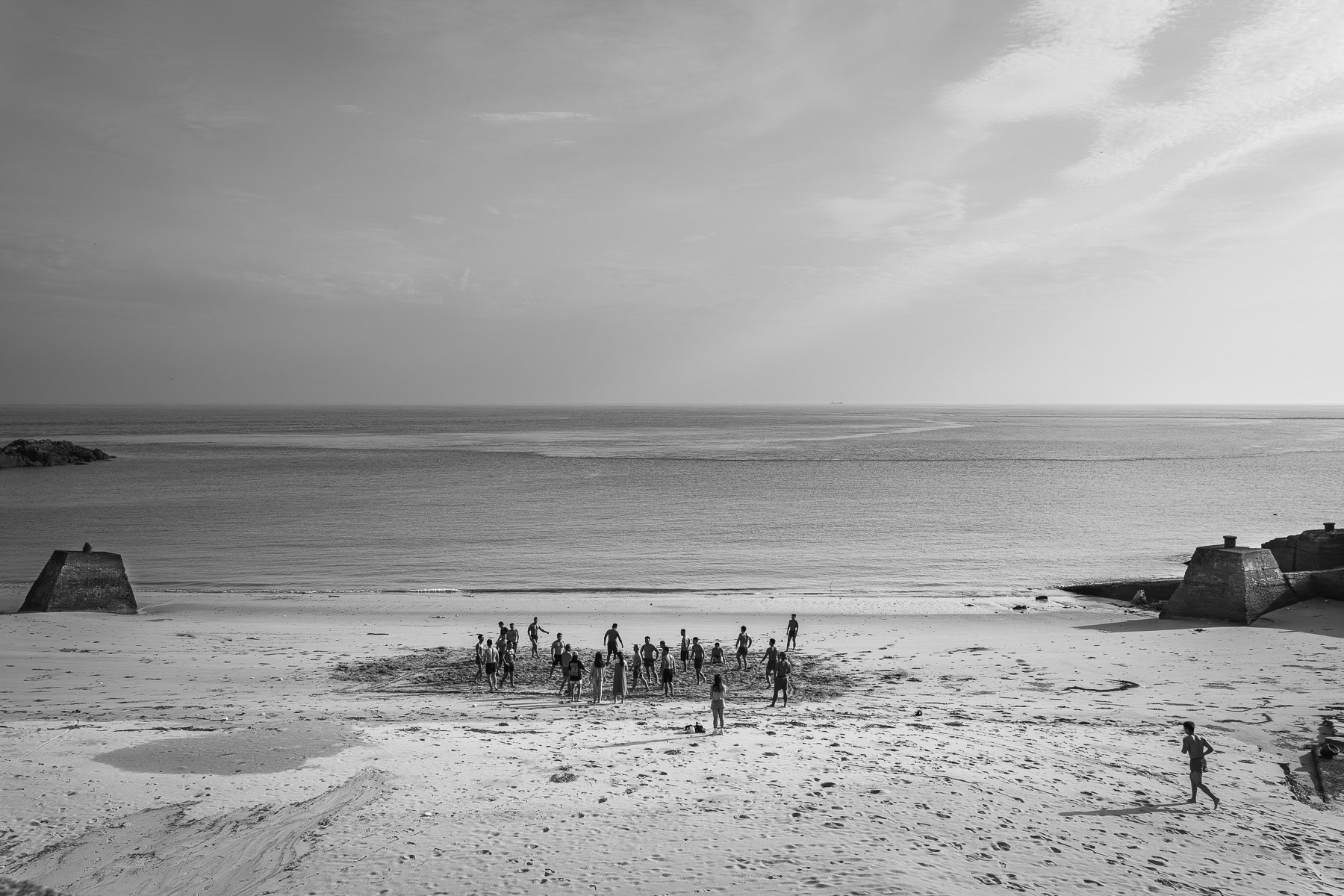 After a day's duty, soldiers from a nearby base unwind with a game of volleyball on the beach. Matsu Islands, Republic of China, May 2025
