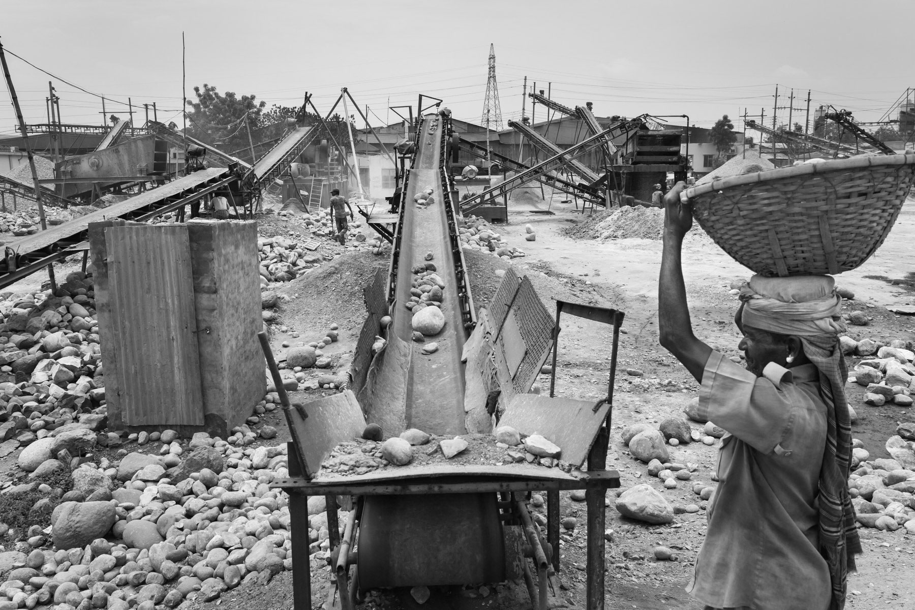 Stone crushing plant at the boat terminal along the Buriganga river in Dhaka, Bangladesh, May 2015