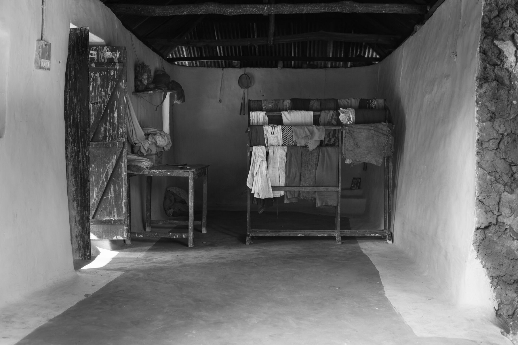 Tea picker's mud house partly collapsed after the monsoon rains, Pulcherra village, Bangladesh, September 2014