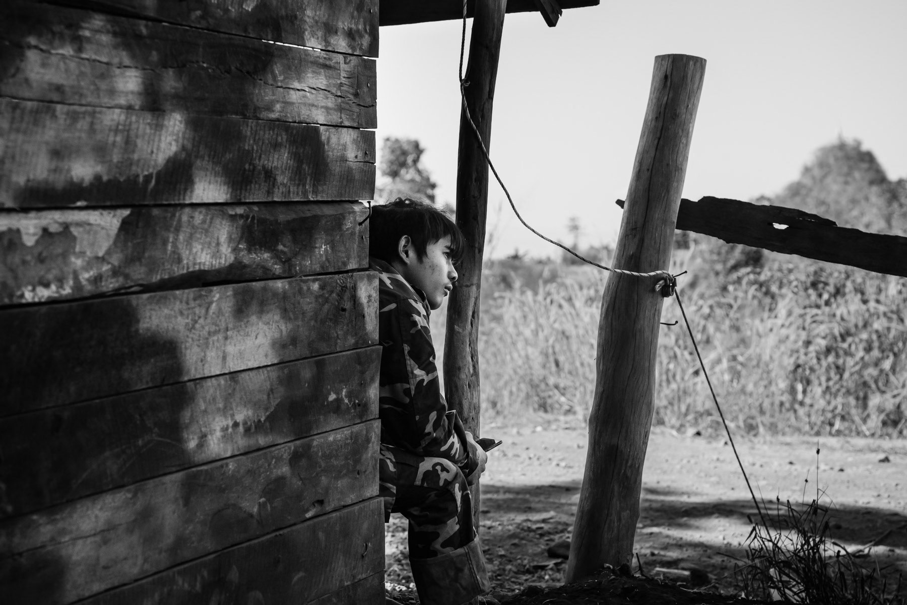 Soldier of the Karen National Liberation Army (KNLA) at a check-point near Kanele village in Karen State, Myanmar, January 2024