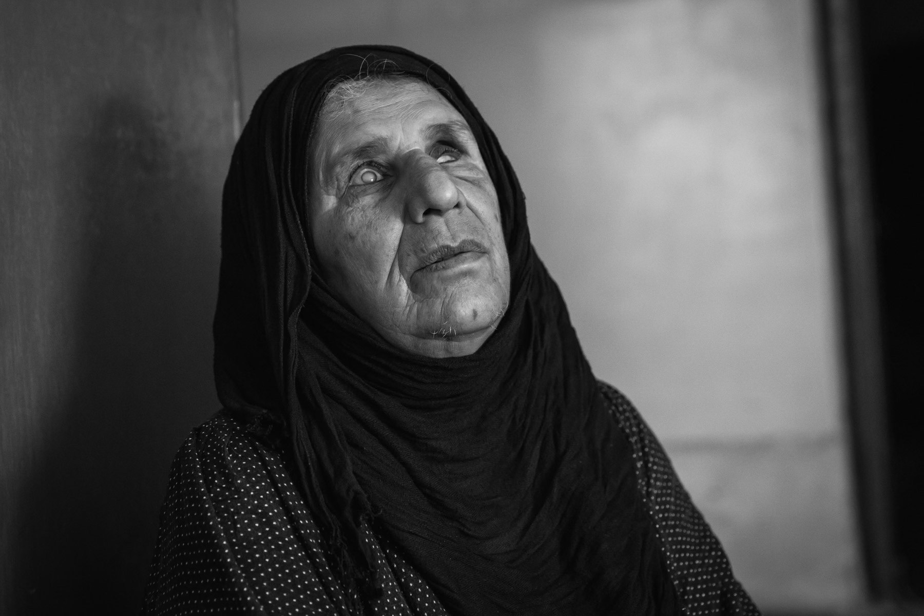 Soweiba, a victim of the Halabja chemical attack of 16 March 1988. She is blind since that day, mainly because it took more than one week after the attack to receive care and reach Teheran. Her five children and her mother all died during the attack. She has severe respiratory problems and requires frequently oxygen. She receives, like other recognized victims, a pension of 300 usd per month. Being alone provokes frequent anguish making her think about what happened 30 years ago and making her feel guilty that she survived. "I wish I died that day together with my 5 children who died in my lap" Halabja, Iraqi Kurdistan, Iraq, August 2018