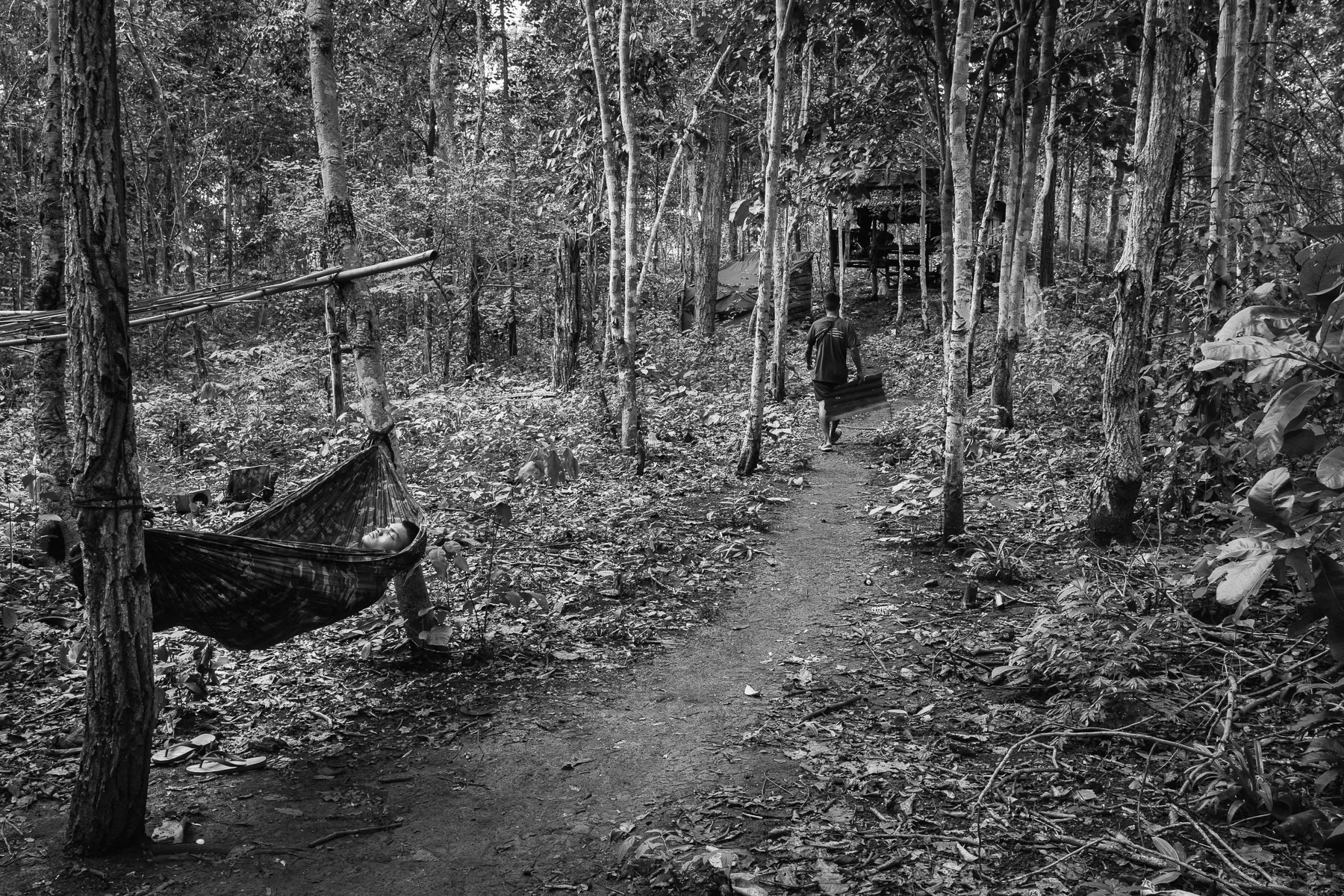 In Myanmar's Karen State, KNLA soldiers pause in June 2025, amidst intense battles for key border areas.