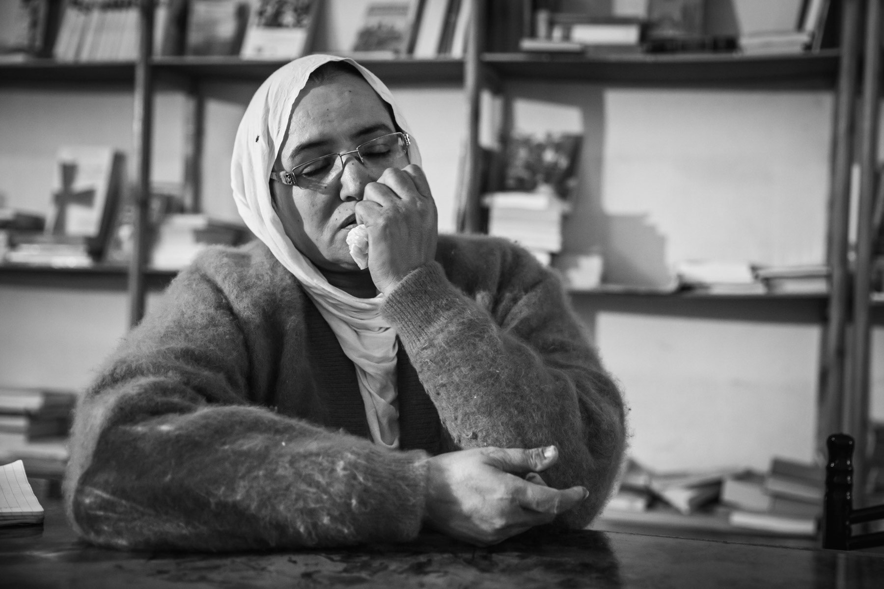 Association of families of Saharawi prisoners and disappeared in Rabouni. Aziza Boutebaa is the daughter of Hanafi who was abducted by Moroccan military in 1986 and most likely executed shortly after. His remains were found in 1991 in a well in the territories of the Western Sahara that are now under Moroccan control. In 2008 her brother dissapeared from Laayoune, and was probably abducted because he installed satellite antennas that could receive Saharawi TV programs. His family has no news about his location or if he is still alive. Hundreds of Saharawi that have disappeared in the territories controlled by Morocco are unaccounted for. In 2013 mass graves started to be found and forensic exhumation is slowly starting. Aziza still lives to this date in areas under Moroccan control. Rabouni, Tindouf, Algeria, December 2019