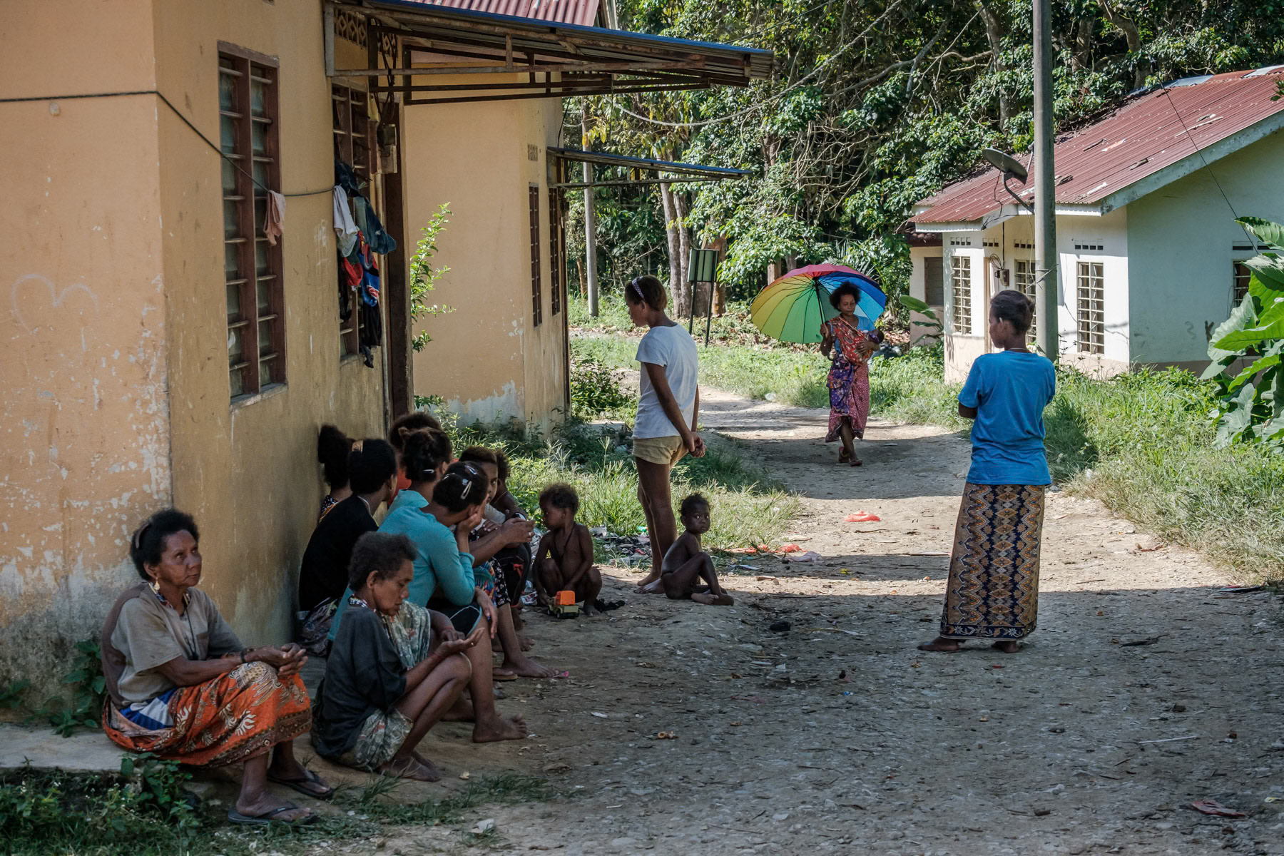 Orang Asli, indingenous people of the Bateq community. Bateq people are originally hunters living with and in the tropical rainforest. During the past decennia mine exploitation, logging and widespread palm oil plantations have severely jeopardized their way of life and livelihood. Through re-settlement projects they are mostly living in small community clusters at the edge of the rainforest. Pecah Keljbi settlement, Merapoh, Pahang, Malaysia, February 2020