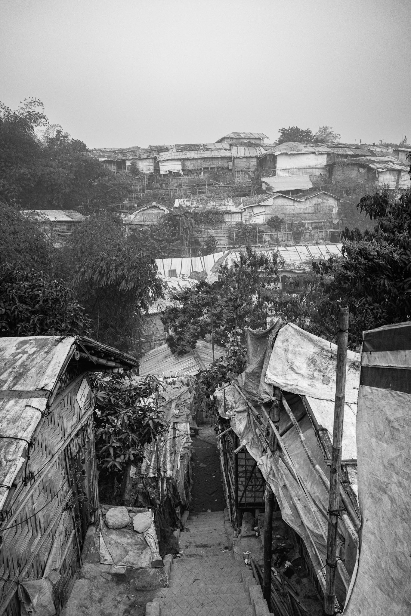 The vertical expansion of the camps is a direct result of the lack of available flat land to house the ever-growing refugee population. Balukhali camp, Bangladesh, January 2026