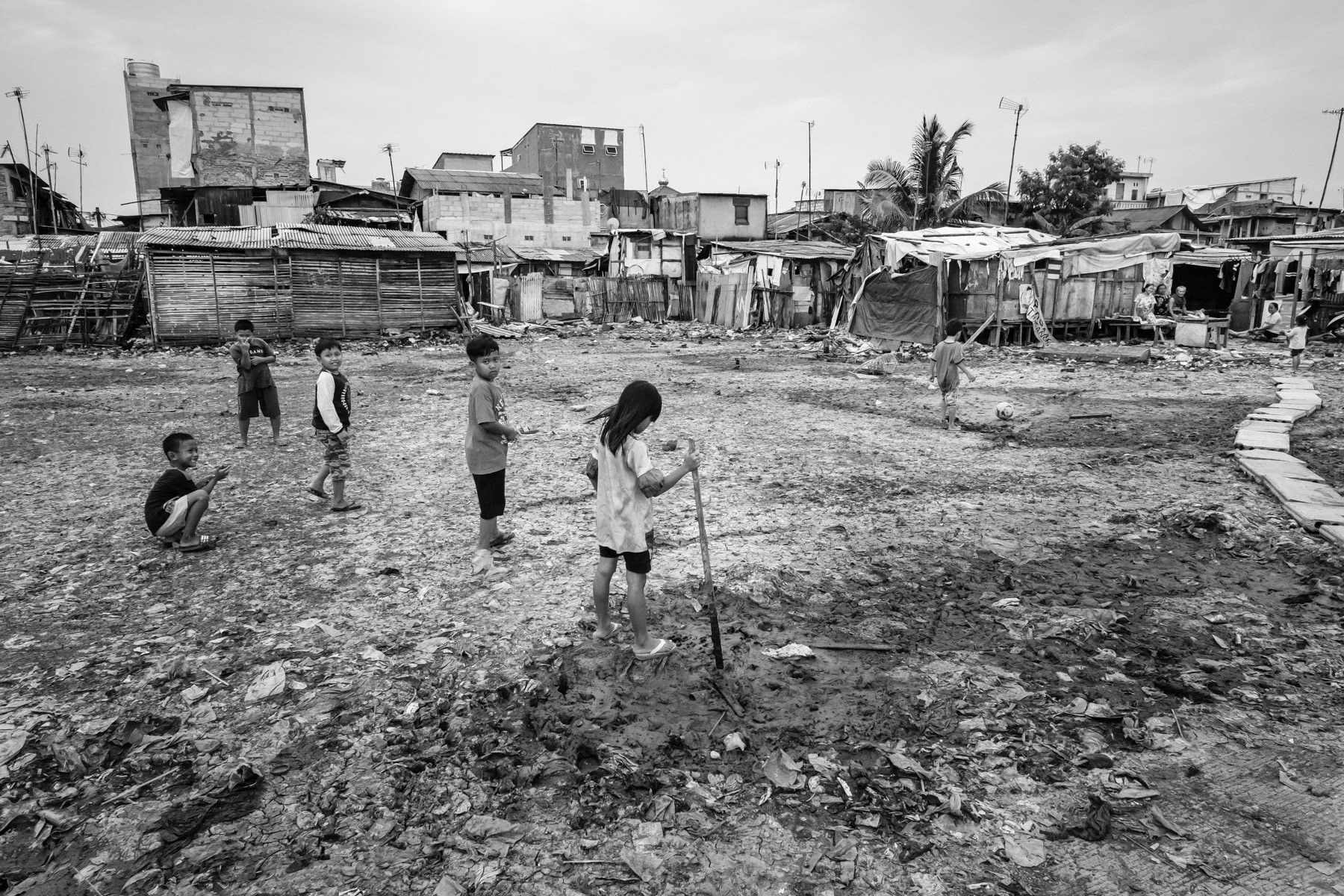 A poor neighbourhood along the sea shore laying a couple of metres under the sea level due to extensive ground water extraction for real estate projects. The ground is sinking at an average of 10 to 20cm per year in most areas along the shoreline in Northern Jakarta, Indonesia, March 2020