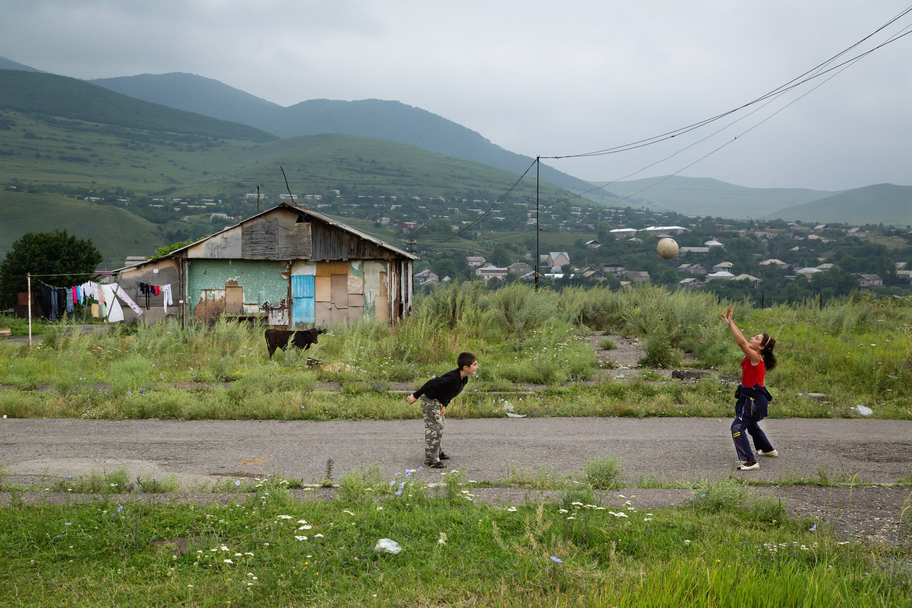 Children playing ball in Garadok domik settlement in Vanadzor, Armenia, July 2014