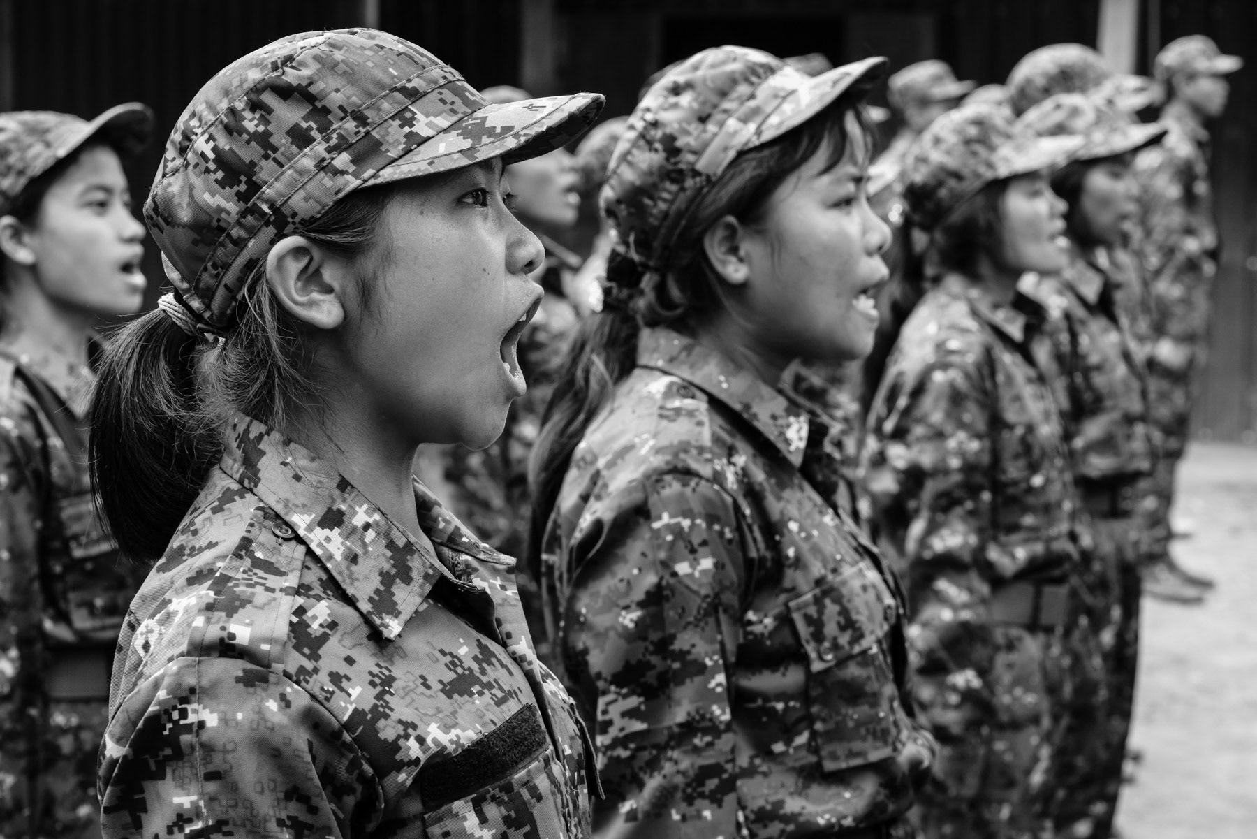 Women new recruits for the Chin National Army (CNA) undergoing a lenghty training before integrating supporting functions within the CNA. Camp Victoria in Chin State, Myanmar, April 2024