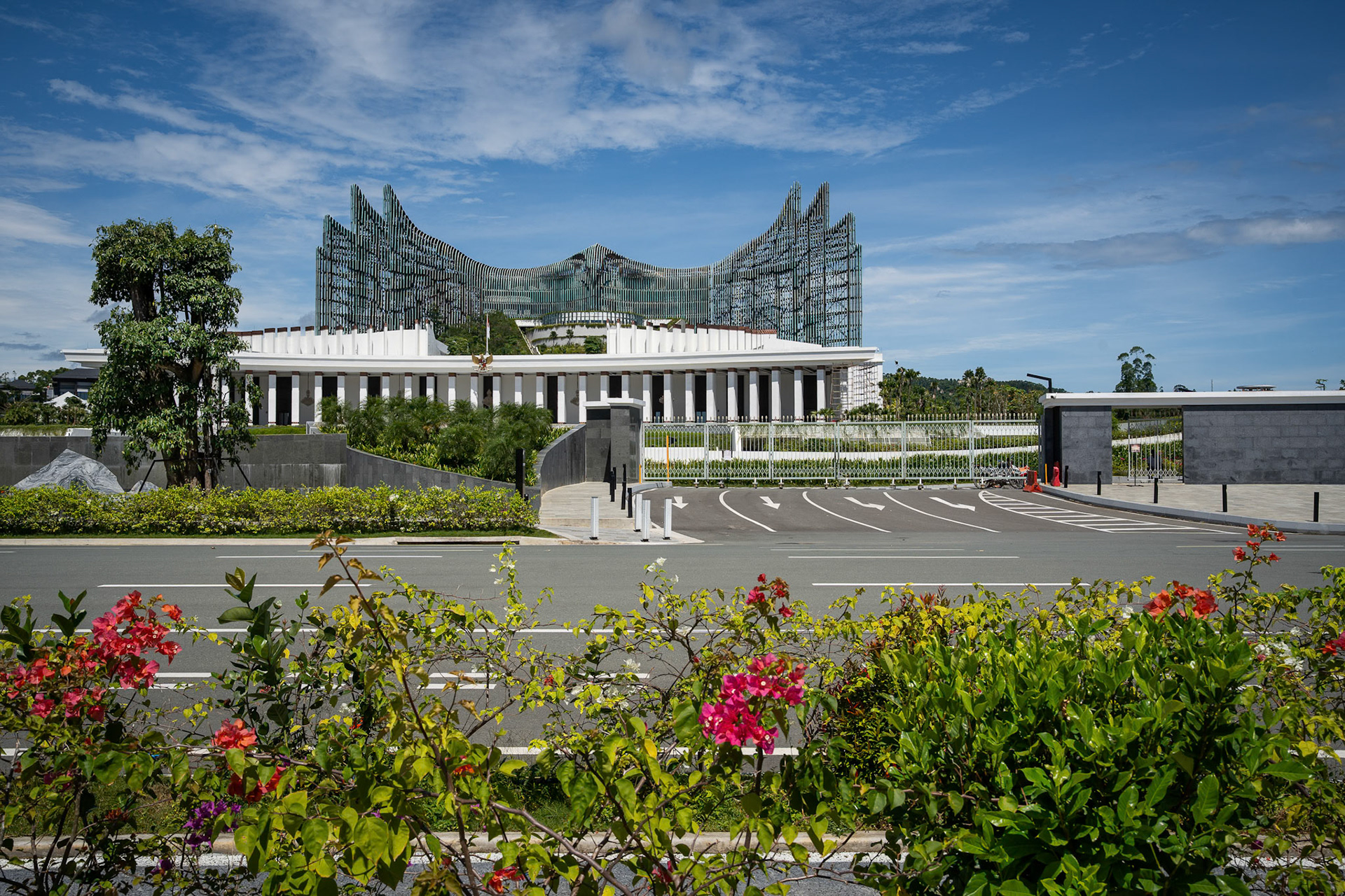 A skyline built on a "forest city" promise, yet the cranes have gone quiet as the new administration looks elsewhere. Presidential palace, Nusantara, Indonesia, January 2026