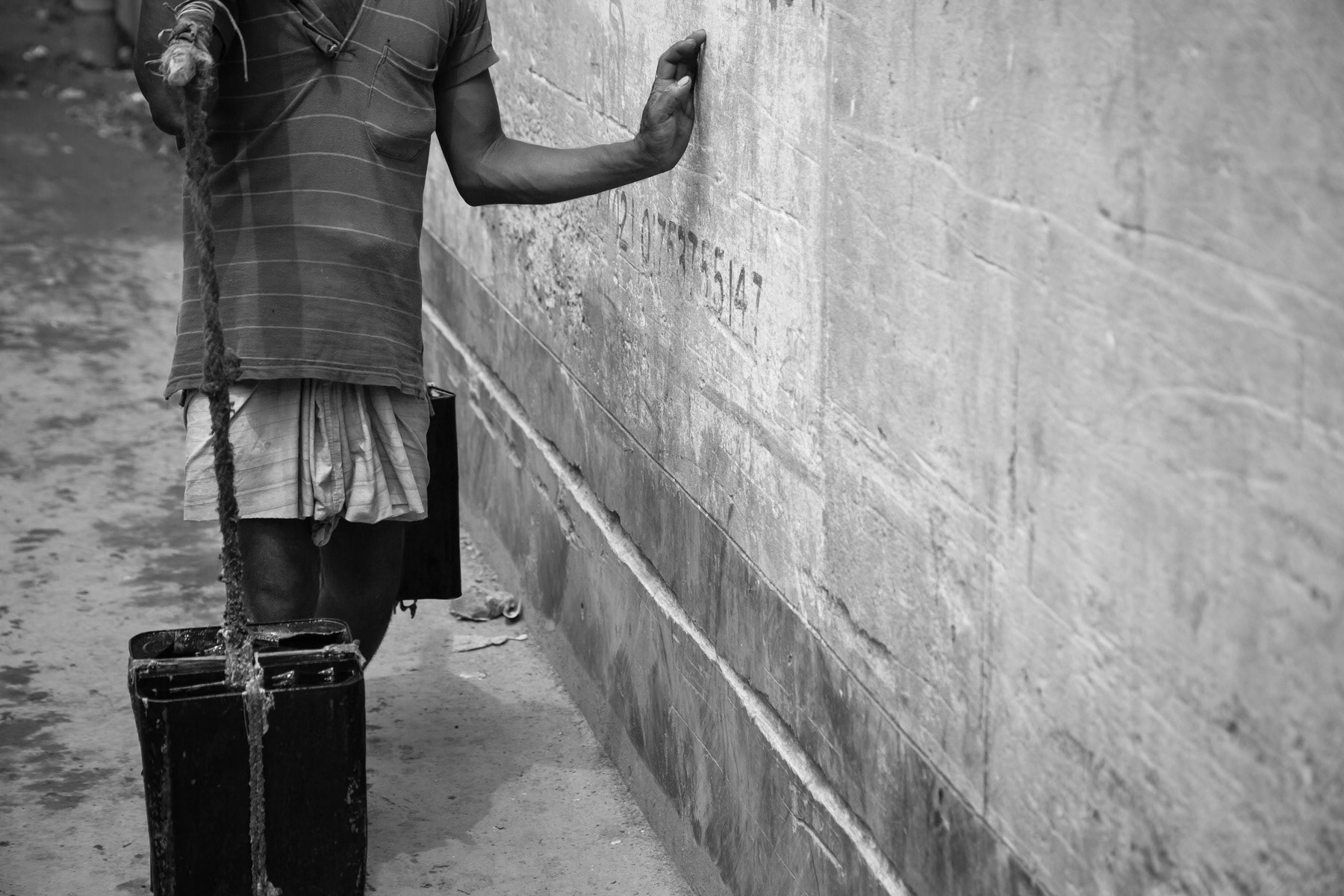 Recovered tannery waste water for use in smaller informal tanneries. Ultimately this waste water and its chemical agents will end up in nearby rivers. Hazaribagh, Bangladesh, October 2014