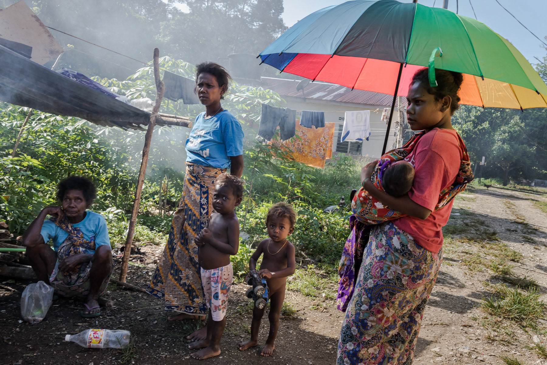 Orang Asli, indingenous people of the Bateq community. Bateq people are originally hunters living with and in the tropical rainforest. During the past decennia mine exploitation, logging and widespread palm oil plantations have severely jeopardized their way of life and livelihood. Through re-settlement projects they are mostly living in small community clusters at the edge of the rainforest. Pecah Keljbi settlement, Merapoh, Pahang, Malaysia, February 2020