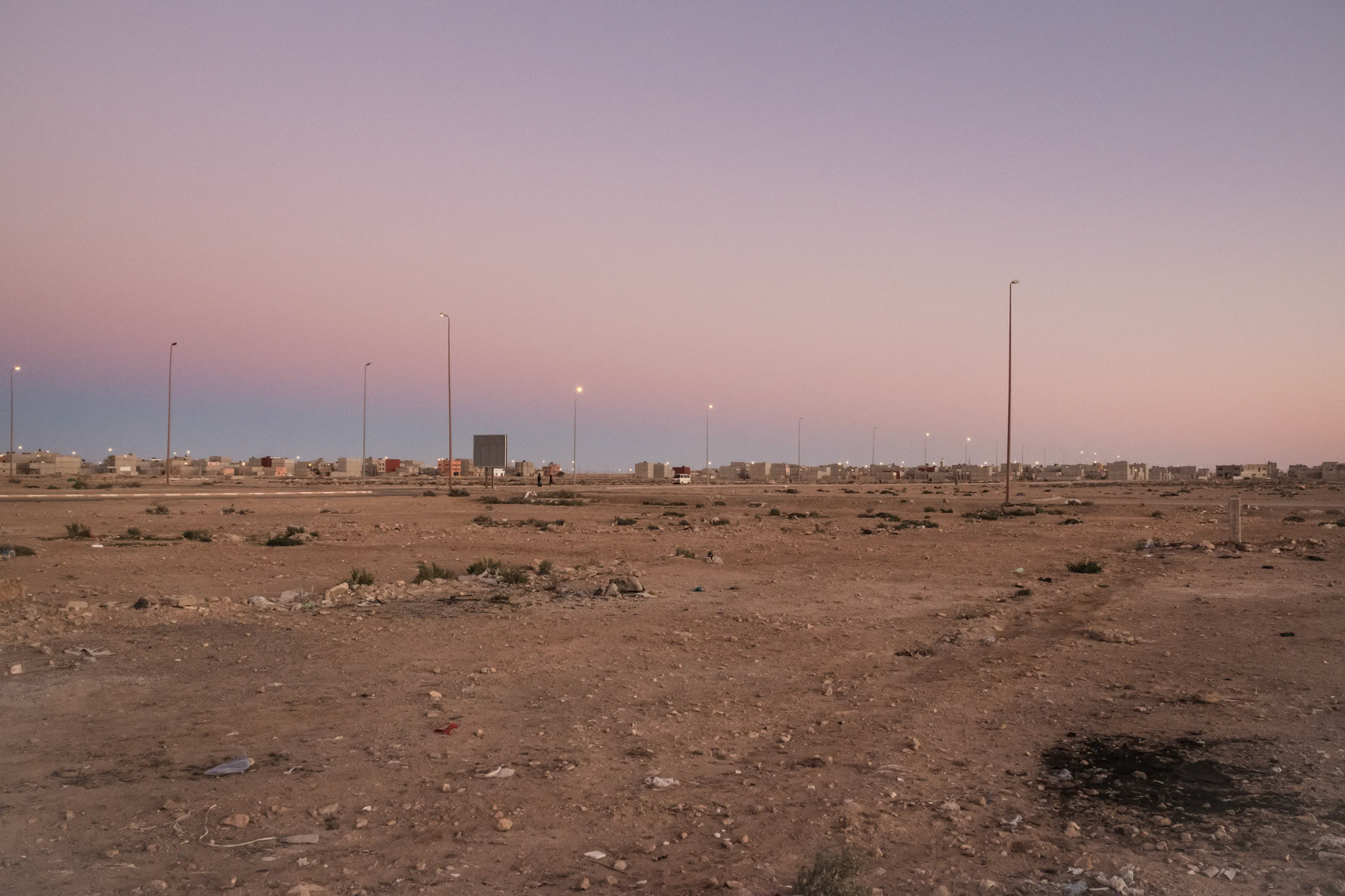 An empty plot build new accomodation blocks. The authorities try very hard to attrack Morrocans to settle in the disputed territory of the Western Sahara by building infrastructure and new neighbourhoods on the edge of the capital. Laayoune, Western Sahara, December 2018