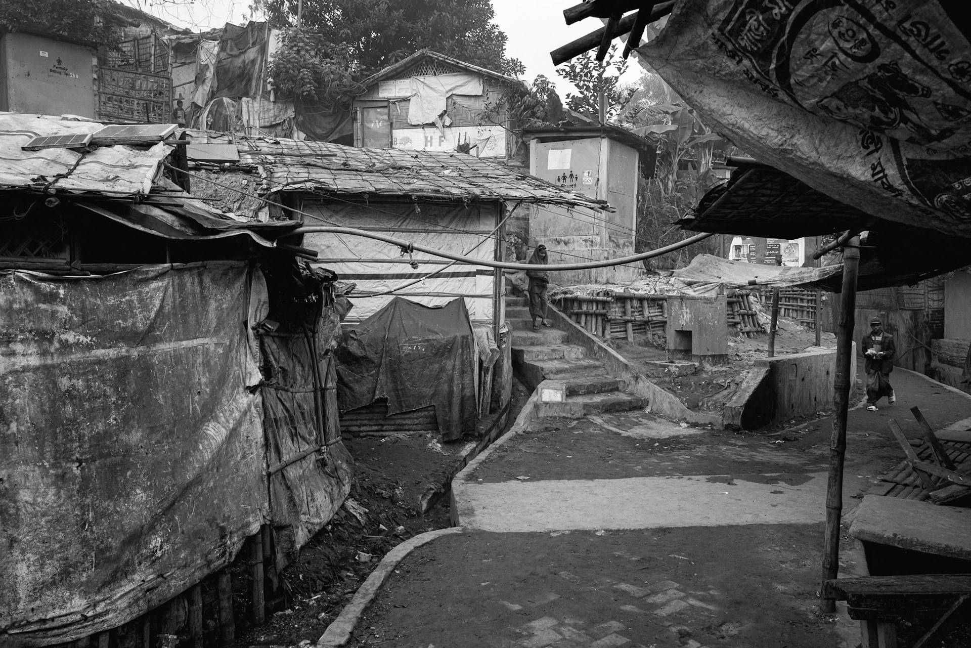 Dense infrastructure and drainage systems. Managing waste and water in the world's most crowded refugee setting is a constant battle against outbreaks of waterborne diseases. Balukhali camp, Bangladesh, January 2026
