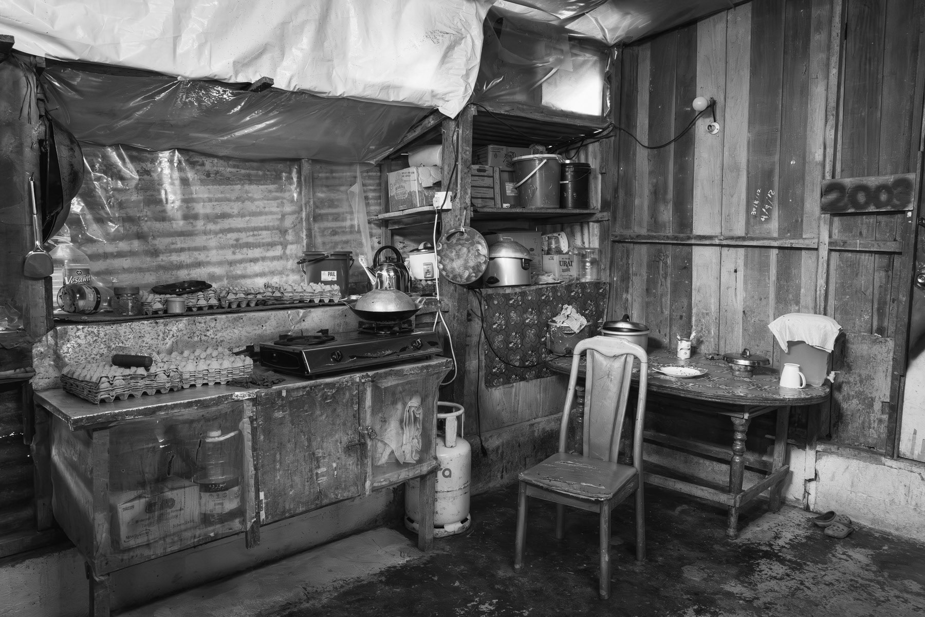 Shelter for farm workers. Most of the workers are refugees or migrants coming from different parts of Myanmar. Kampung Raja in Cameron Heighlands, Pahang, Malaysia, May 2024