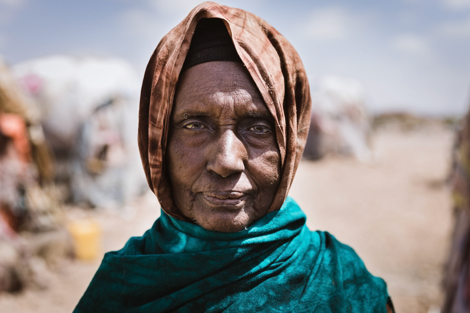 One of the 4,500 displaced persons living near the capital of Somaliland. Ten thousands of pastoralists have lost all their livestock during the past drought and became fully dependent on humanitarian aid for their subsistance. Most have abandon their nomadic way of life and settle in makeshift camps where aid and food can reach them. Hargeisa, October 2017