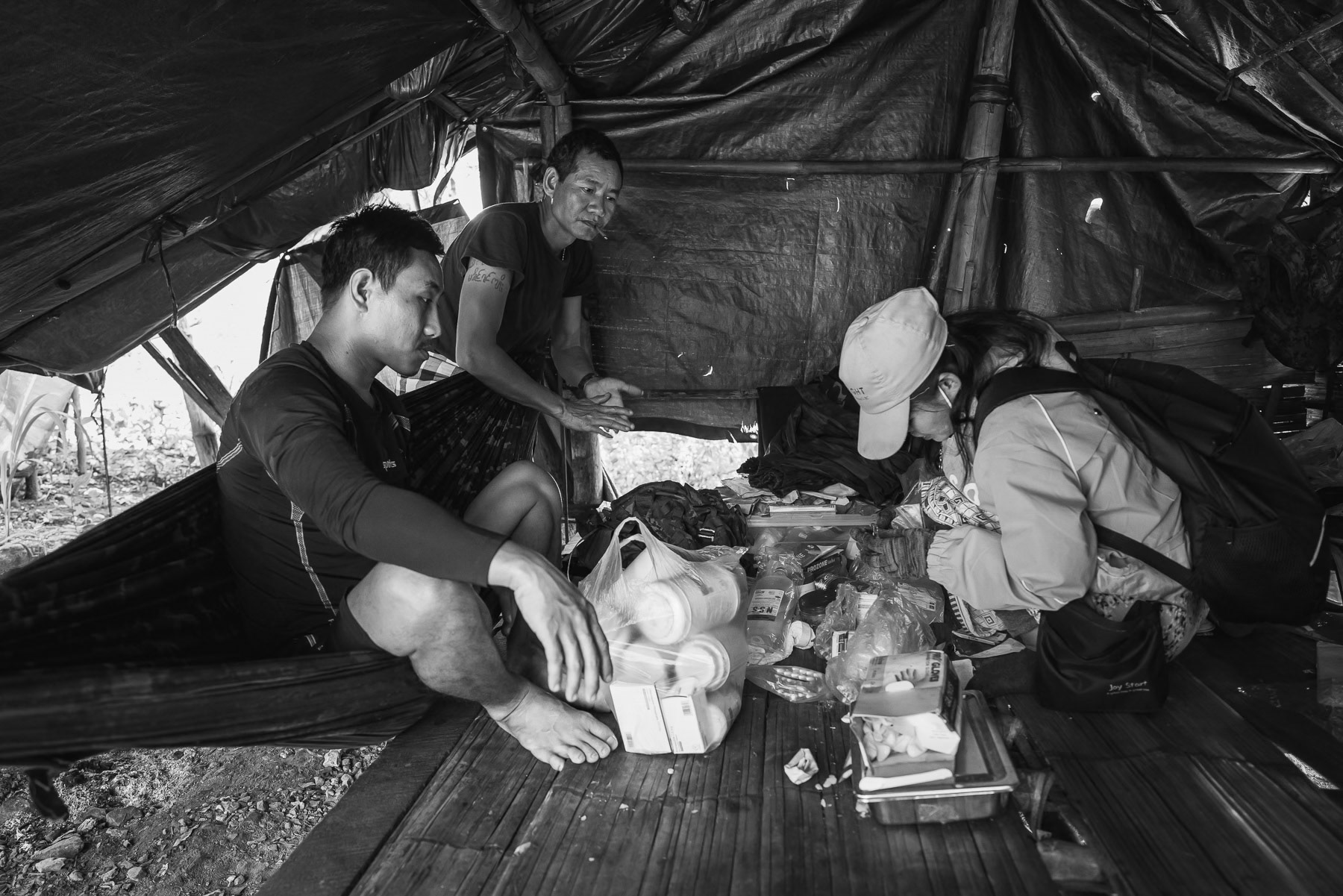 A nurse from the Karen National Union (KNU) health services verifying medecines available at a KNLA unit at the frontline, Kayin State, Myanmar, September 2024