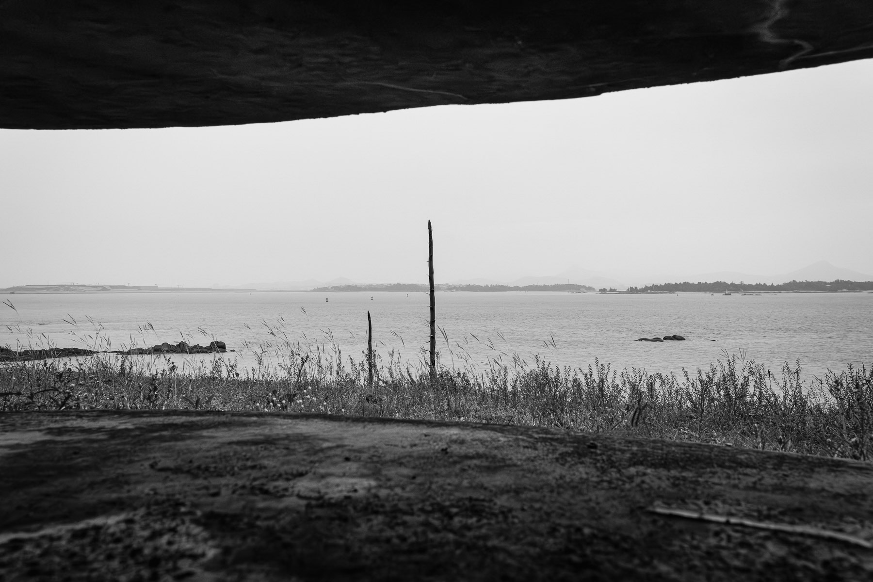 Xiamen looms across the Taiwan Strait, a constant reminder of the proximity. Mashan observation post, Kinmen island, Republic of China, May 2025