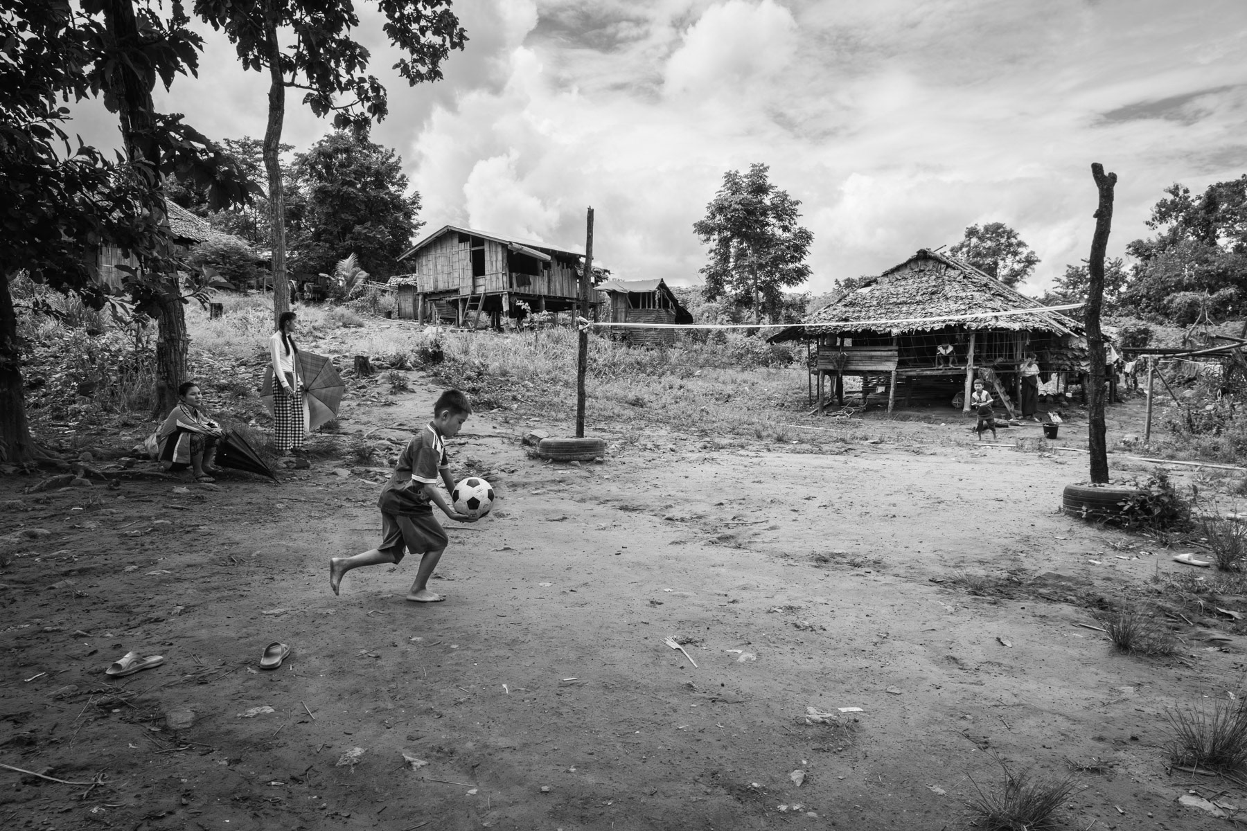 Karen children in a camp for internal displaced persons (IDP). Ever since the military coup in Myanmar, the intensity of the conflict has dramatically increased in ethnic minority areas and repeated airstrikes on civilian population have uprooted people in the millions throughout the country. Htee Baw Kaw camp in a part of Kayin controlled by the Karen National Union, Myanmar, September 2023