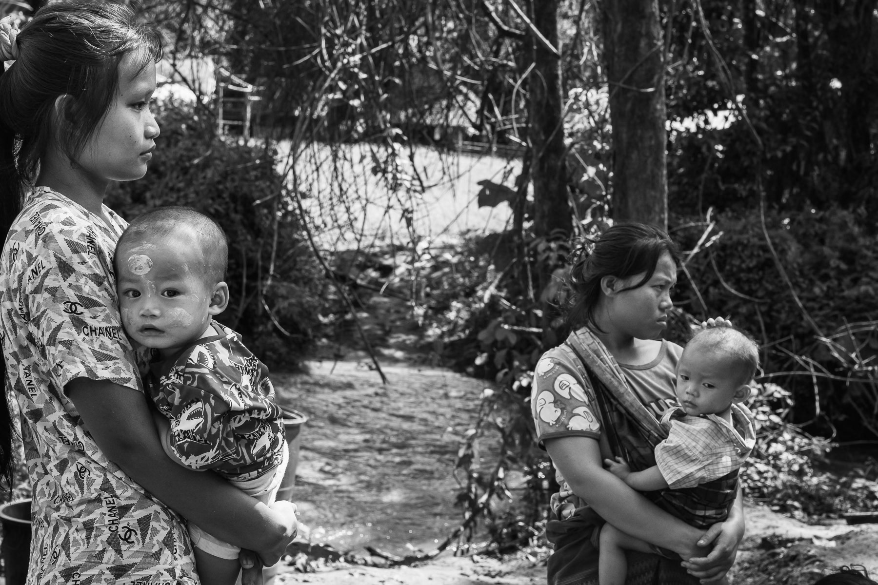 Karen mothers attending a training on healthcare and sanitation at a clinic run by the Karen National Union health administration. Kanele, Karen State, Myanmar, September 2024
