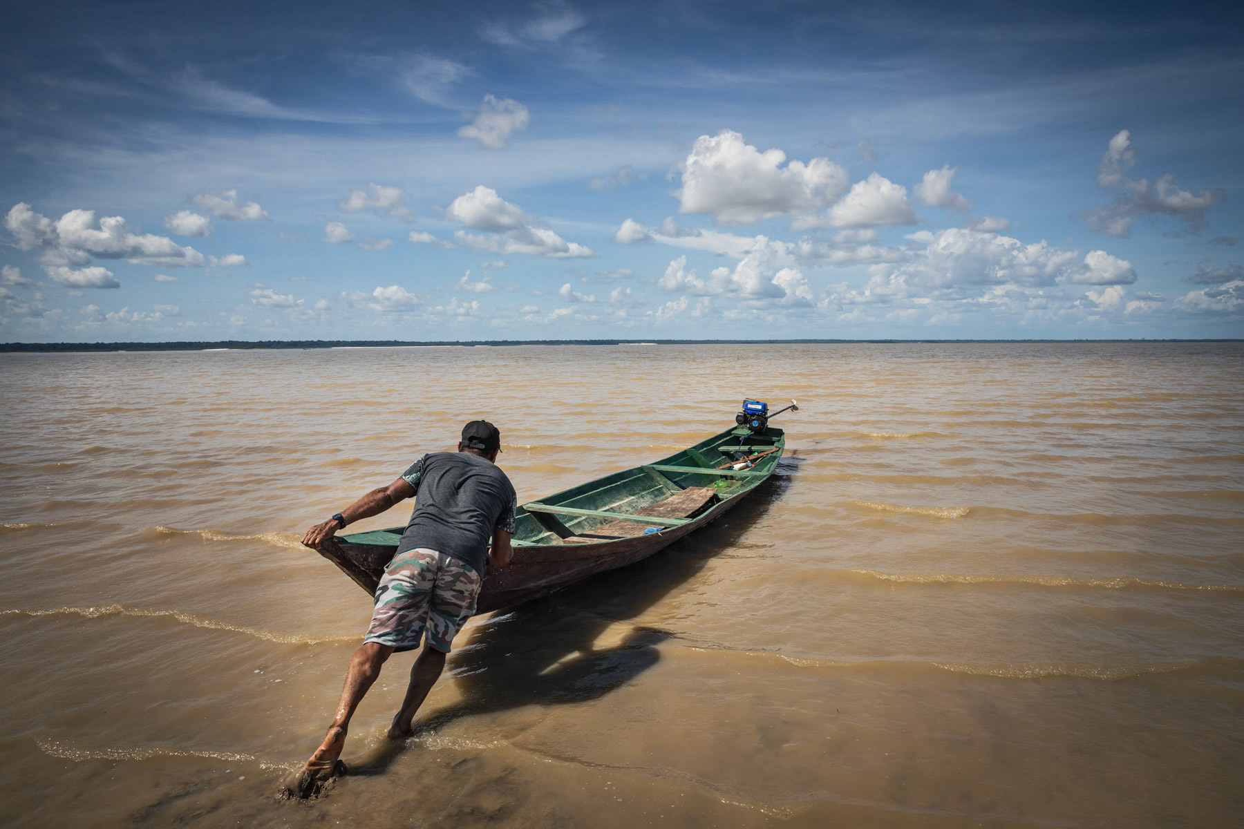 Small boat used to shuttle between villages around the Tefé lake. The Tefé river is a tributary of the Amazon. Before merging into the Amazon it forms a lake in the city of Tefé. Tefé and its surrounding vast area are only reachable by boat or airplane, no road network reach the area, keeping it protected from major agro industrial and deforestation projects. Tefé, Amazonas state, Brazil, October 2020