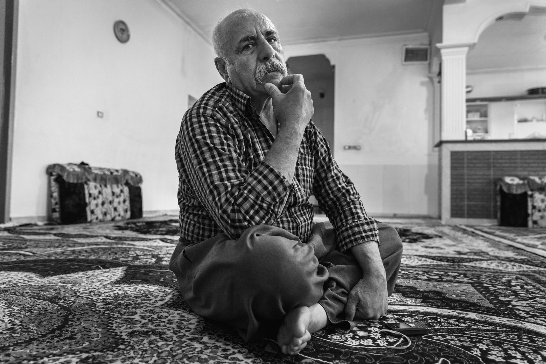 An ex resident of Zardeh and survivor of the chemical attack. Moved last year to the city 3 hours away to be closer to medical care and away from the dust and sand storms affecting the village. Kermanshah, Iran, April 2018