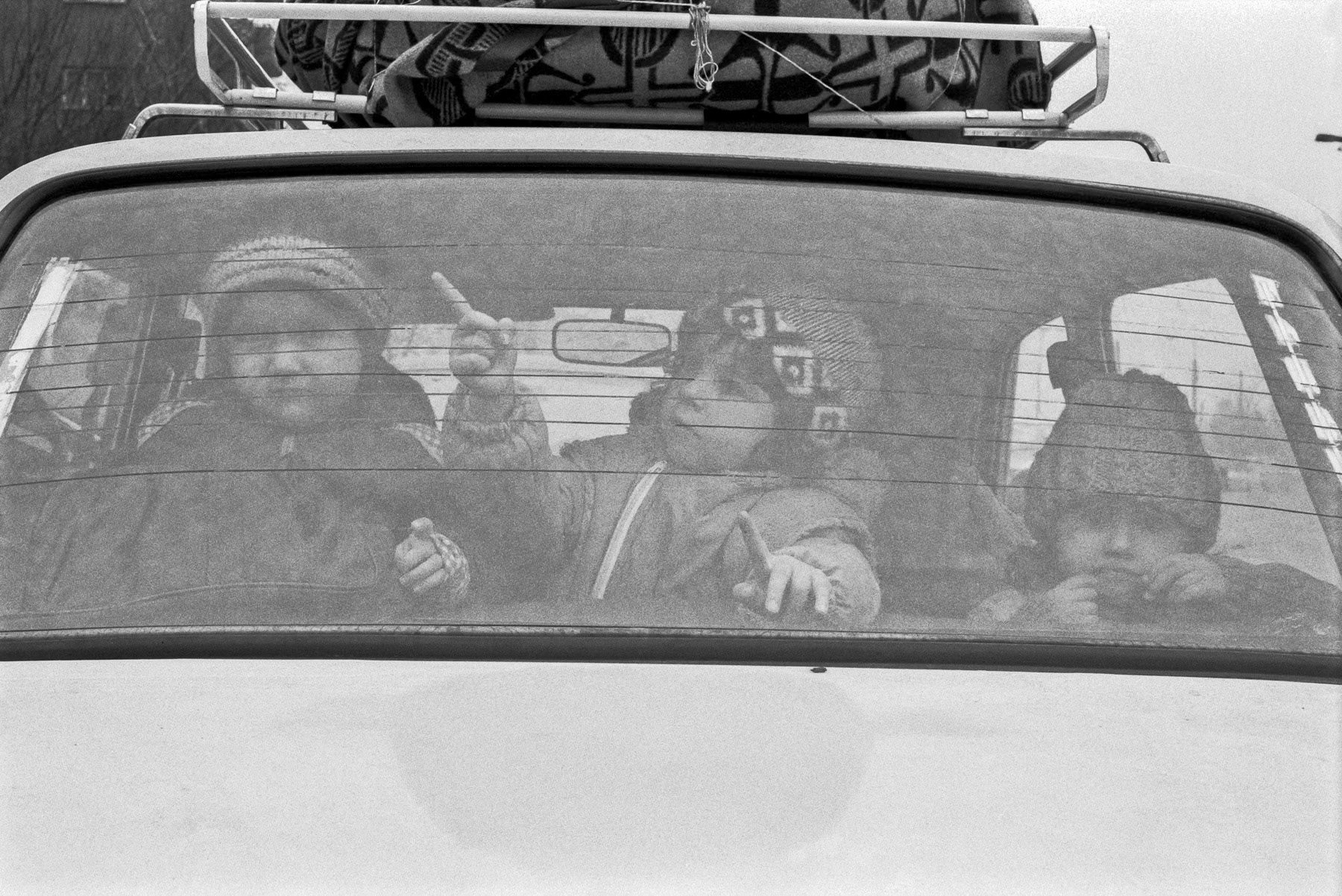 Children observing, Bucharest, Romania, April 1991