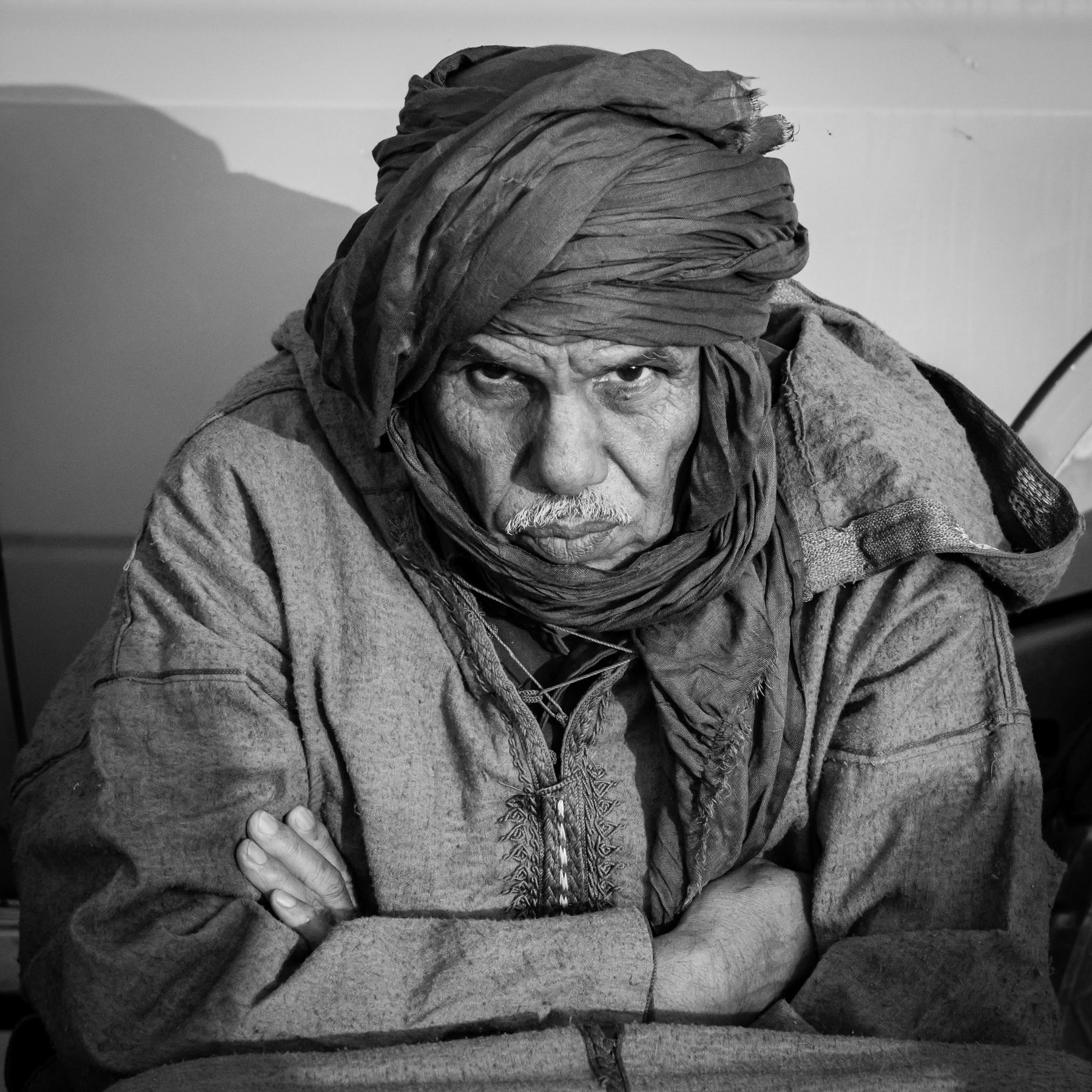 Sahrawi military commander of a mobile unit operating at the frontline where Morocco has built a 2,700 km long sand berm dividing the Western Sahara between the Moroccan controlled territories and Sahrawi liberated territories. Mobile camp in the desert in the northern second military region, Sahrawi Arab Democratic Republic, October 2021