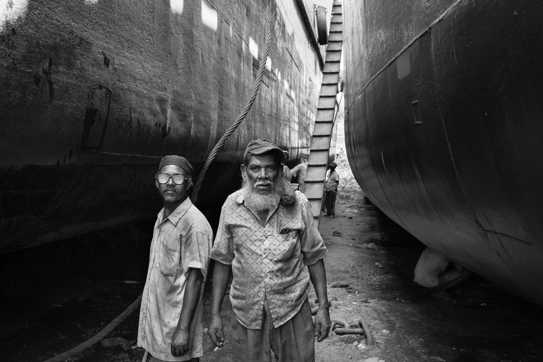 Ship construction and repair in Bangladesh is done mainly by hand, using recycled old metal and parts from the ship-breaking yards in Chittagong. Shipyard workers in Kerinigong, Dhaka, Bangladesh, October 2014