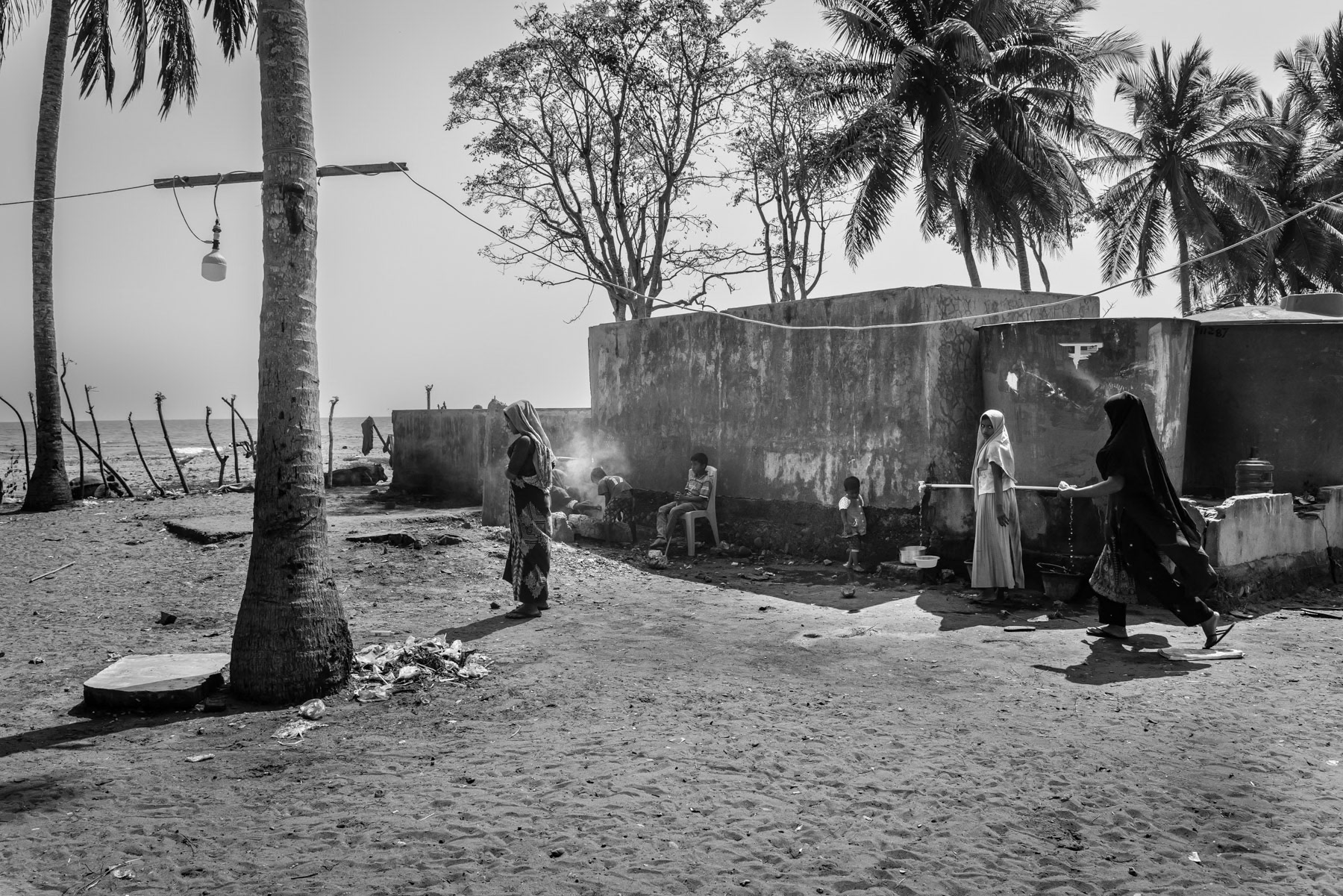 Rohingya refugees from Myanmar on the coast of Aceh where they landed after having fled by boat from Myanmar. The Rohingya have been persecuted for many years in their homeland making them flee for safety and survival to Bangladesh, Malaysia and now Indonesia as boat people spanding several weeks at sea on unworthy boats at the peril of their lives. Pidie shore, temporary shelter, Aceh, Indonesia, February 2024