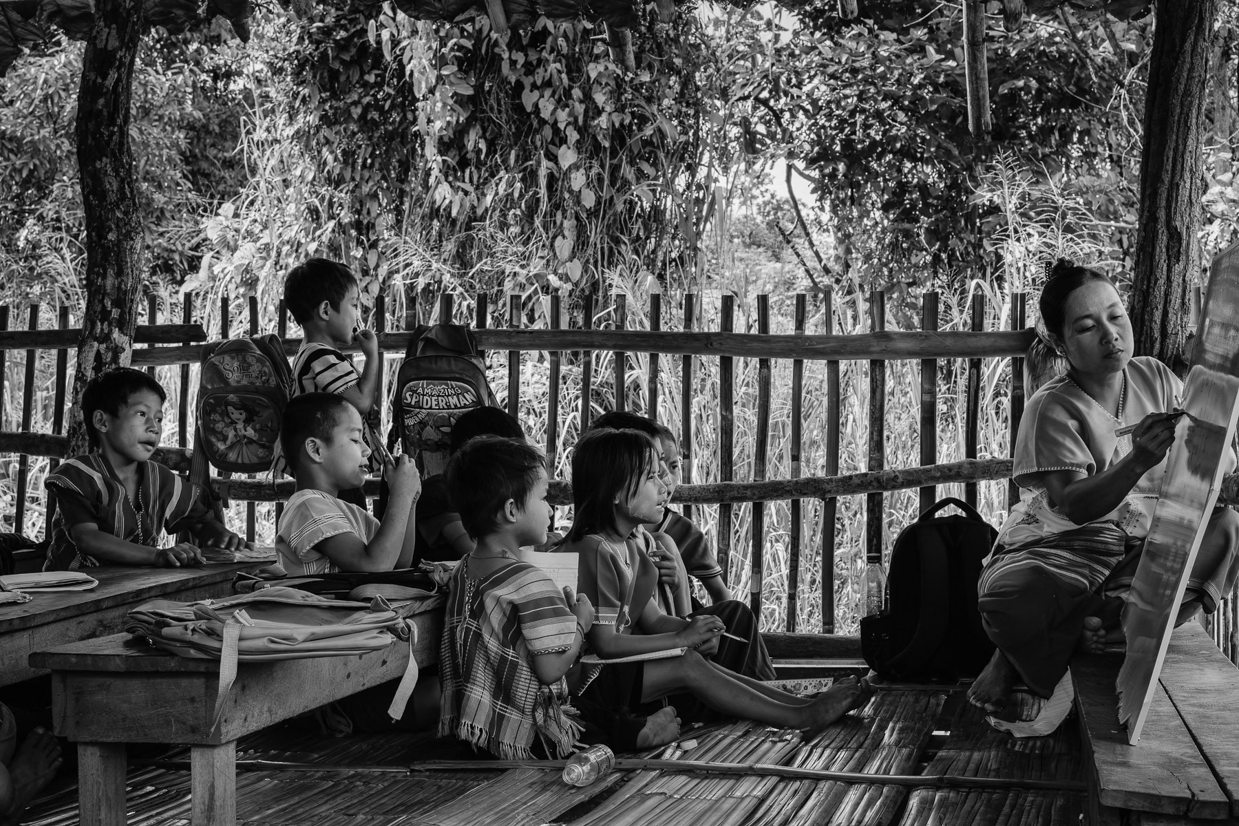 Class for young children at a temporary school for displaced persons. Htee Baw Kaw camp for internally displaced people. Kayin State in Myanmar, September 2024