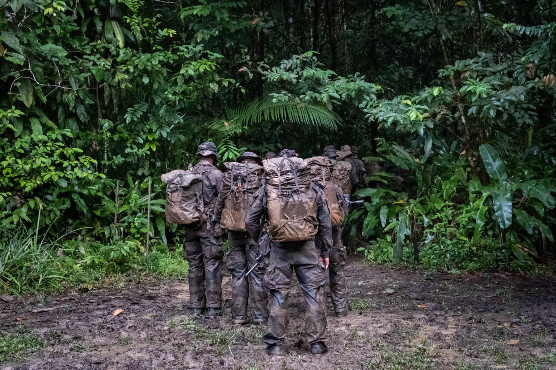 Regional military training camp in the Amazon organised for French and foreign allied military in jungle war fare. Many are Brazilian and Colombian and will be engaged in security operations across the Amazon against illigal gold mining and drug trafficking. Foreign Legion military camp, Regina, French Guyana, March 2022