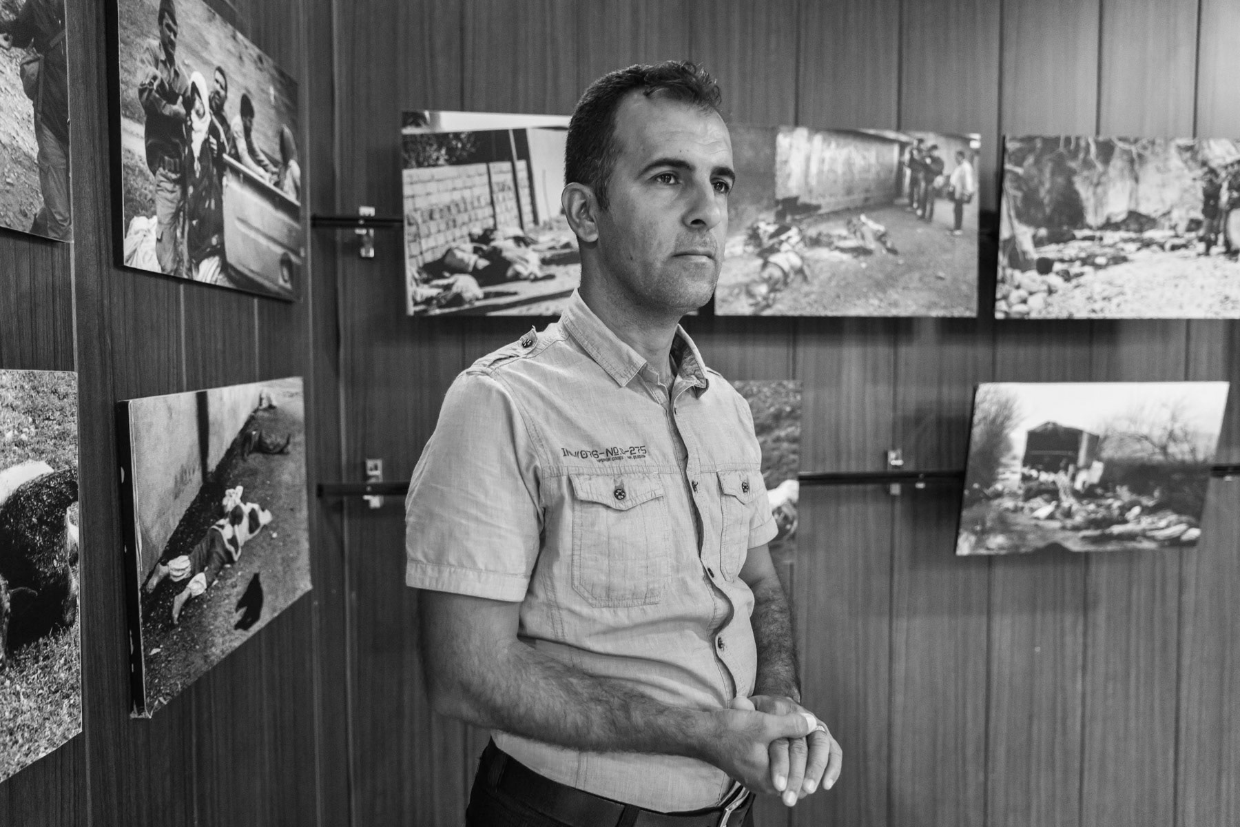 M. Saeed, 36 years old, a victim and lone survivor of the Halabja 1988 chemical attack. Had 2 brothers and 2 sisters who fled with him during the attack, one brother and sister died during the attack while escaping, the other brother died in 1996 as a consequence of chemical exposure. He was eventually evacuated together with his 3 year old sister to Teheran where she was separated from him. To date he has never seen or heard anything bout his siter anymore. She is part of the disappeared children of Halabja, Nearly 100 children from Halabja that were evacuated as toddlers to Iran are unaccountable for, only 9 have been re-united with family during the the past 30 years. Living with the trauma of be the sole survivor of his family, he does his best to protect his children from the horror he went through. Halabja Memorial Museum for victims of the chemical attack with photographs taken by Iranian photographers shortly after the attack. Halabja, Iraq, August 2018