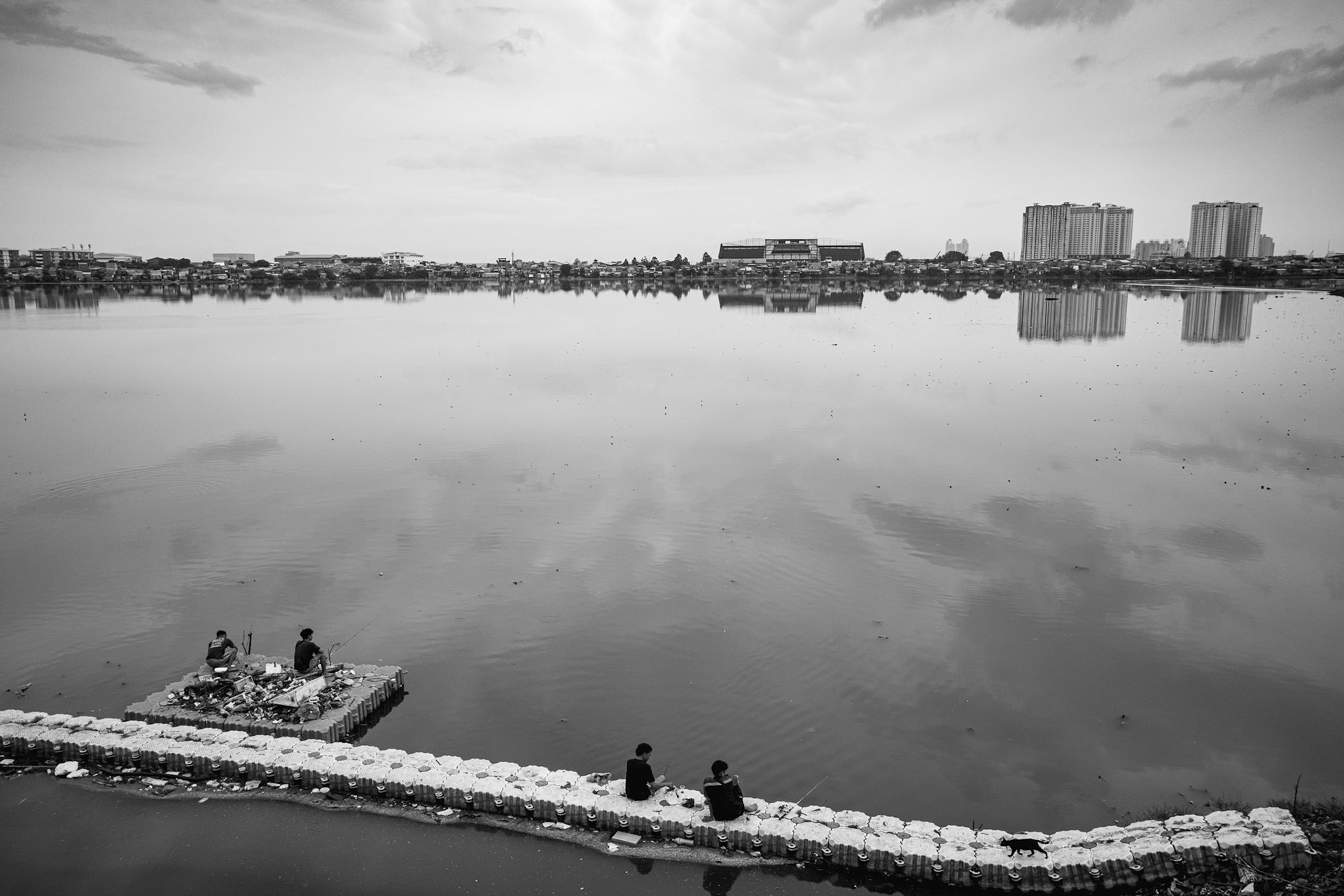 A mirror on the reservoir levels, showing a city balanced on a knife-edge of water management. Pluit reservoir in Northern Jakarta, January 2026