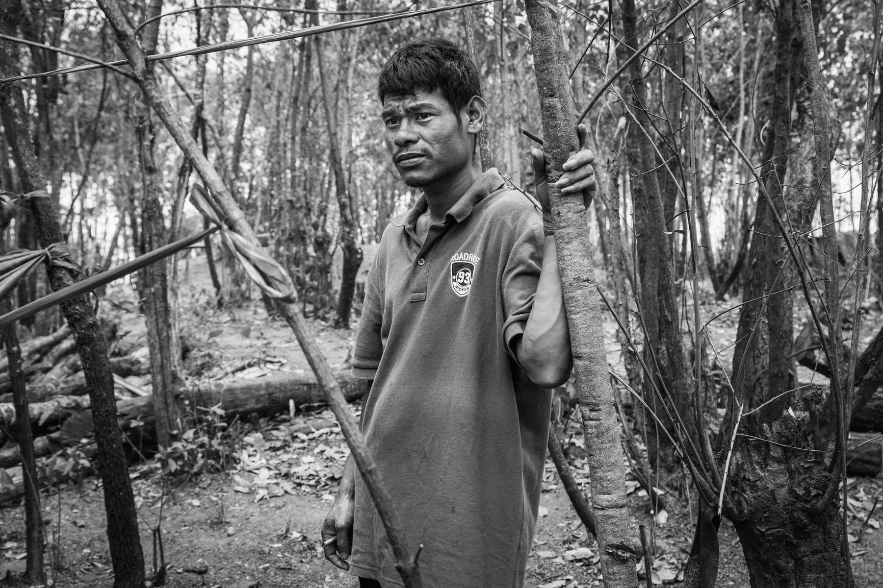 Than Win Hlaing is 32 years old and from Rakhine State. He deserted the Myanmar military in October 2022 and joined the civil desobdience movement (CDM) after giving himself over to Chin Defence Forces. He was first sent to a CDM camp in Champai and was recently recruited as a cook for a unit of the Chin Defence Forces operating in Falam township of Chin State. He has been enrolled in Tatmadaw for 20 years since he became an orphan at the age of 12. Since he was enrolled in the Myanmar Army at the age of 12 he could never return to Rakhine and seek contact with his siblings and relatives. With Tatmadaw he was stationed in Nay Phi Daw, Maputi and Bago from where he was sent to Karen State during the 2010-2012 ethnic cleansing campaigns against the Karen ethnic minority group, which he has witnessed. Lian Hna CNDF outpost, Falam, Myanmar, May 2023