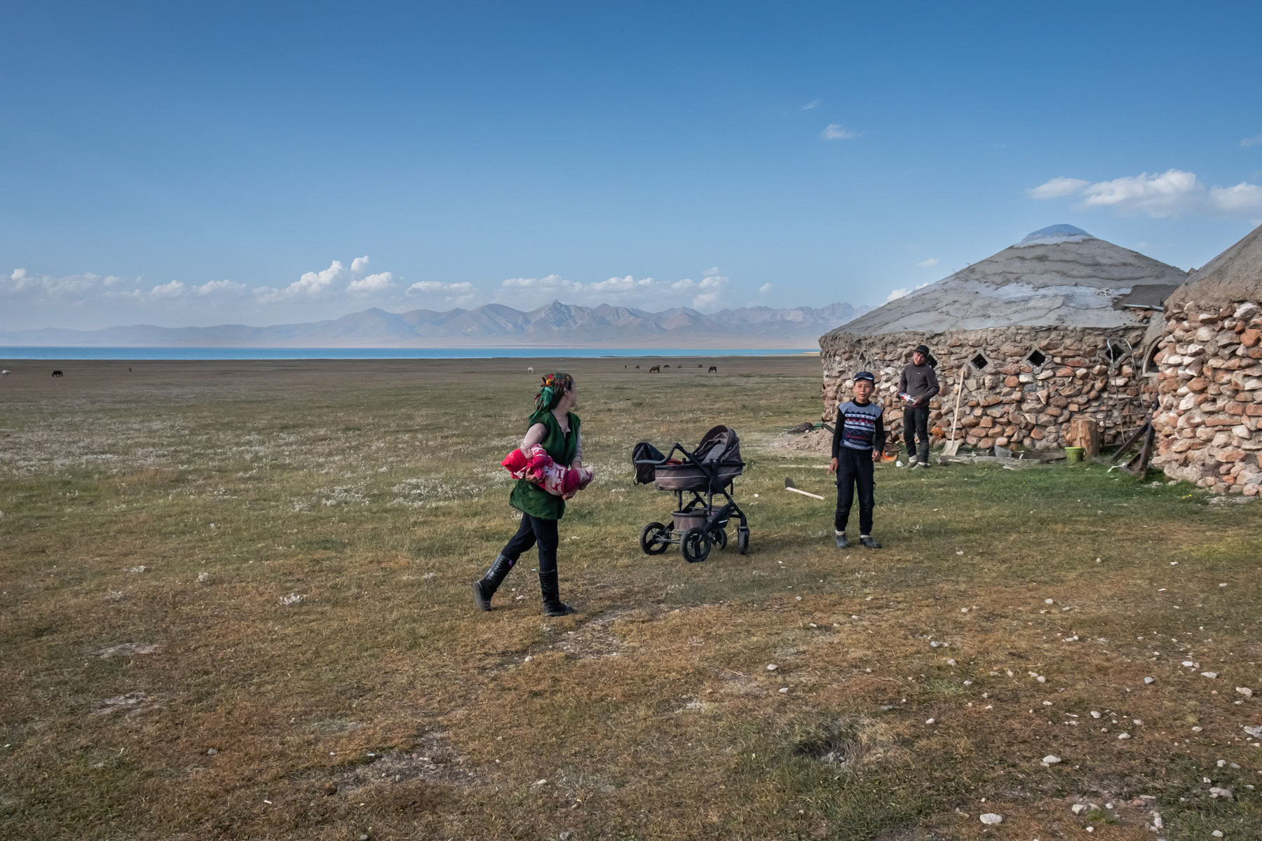 A family staying for about 3 summer months at high altitude along the shore of Son Kul Lake where they breed horses, keep several hundreds sheep and run a small guesthouse for passing travellers. During the remaining of the year they live down the valley near the Naryn river. Son Kul Lake, Kyrgyzstan, August 2021