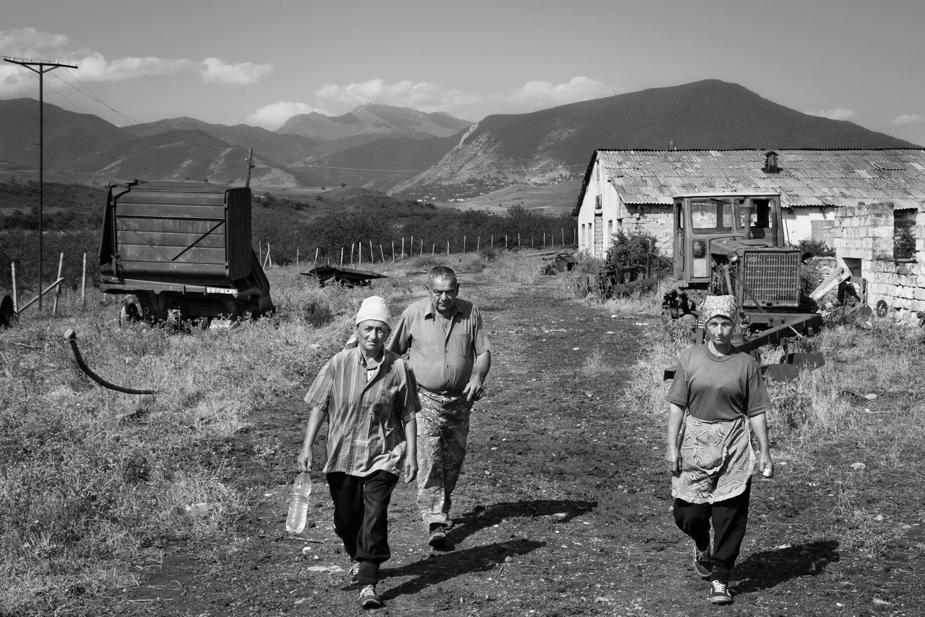 Agriculture workers heading for the fields, farming cooperative in Okhch, Karabakh, July 2014