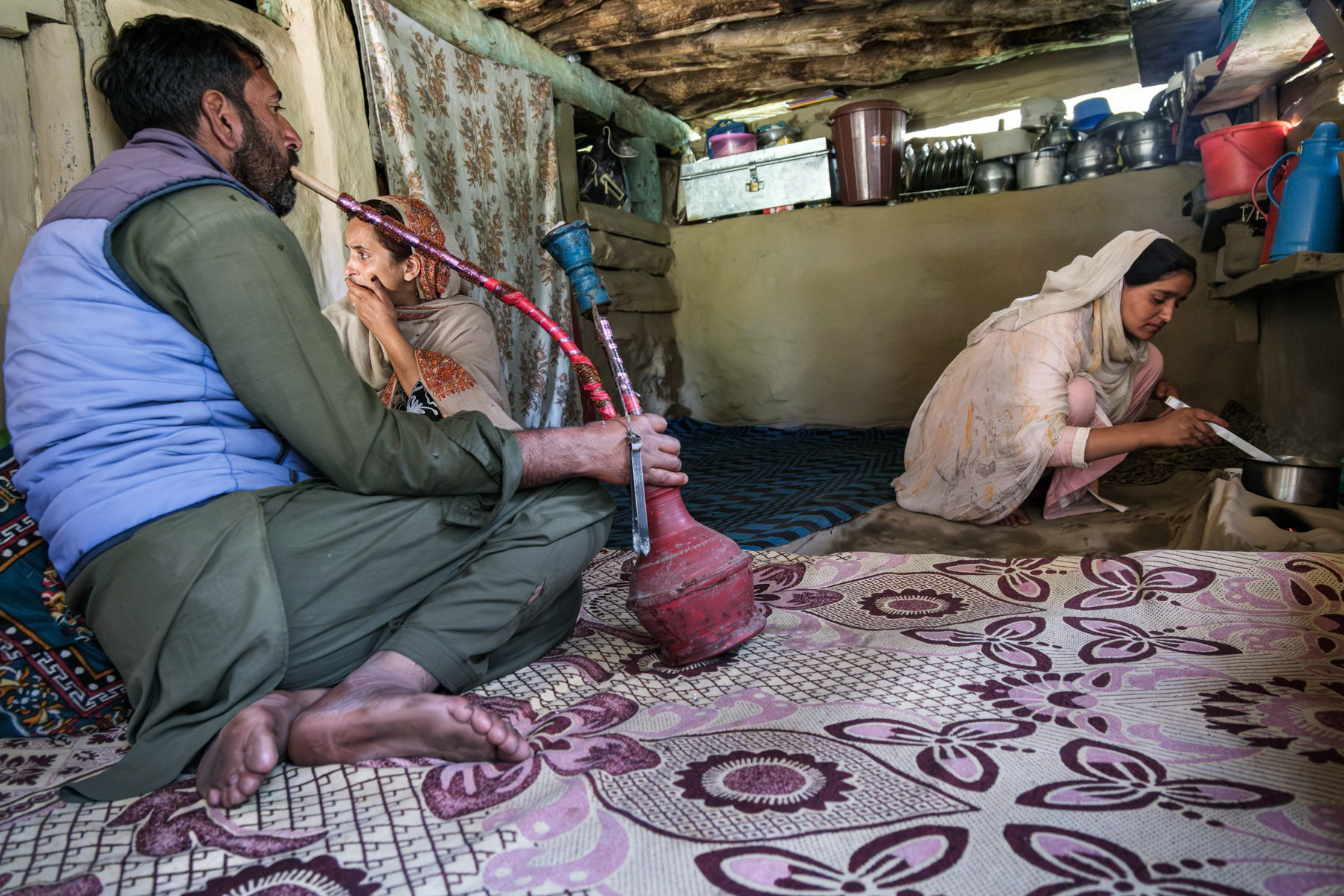 Shepherd family in their summer shelter above 2000m in the Kashmiri mountains, Naranaag, Kashmir, September 2023