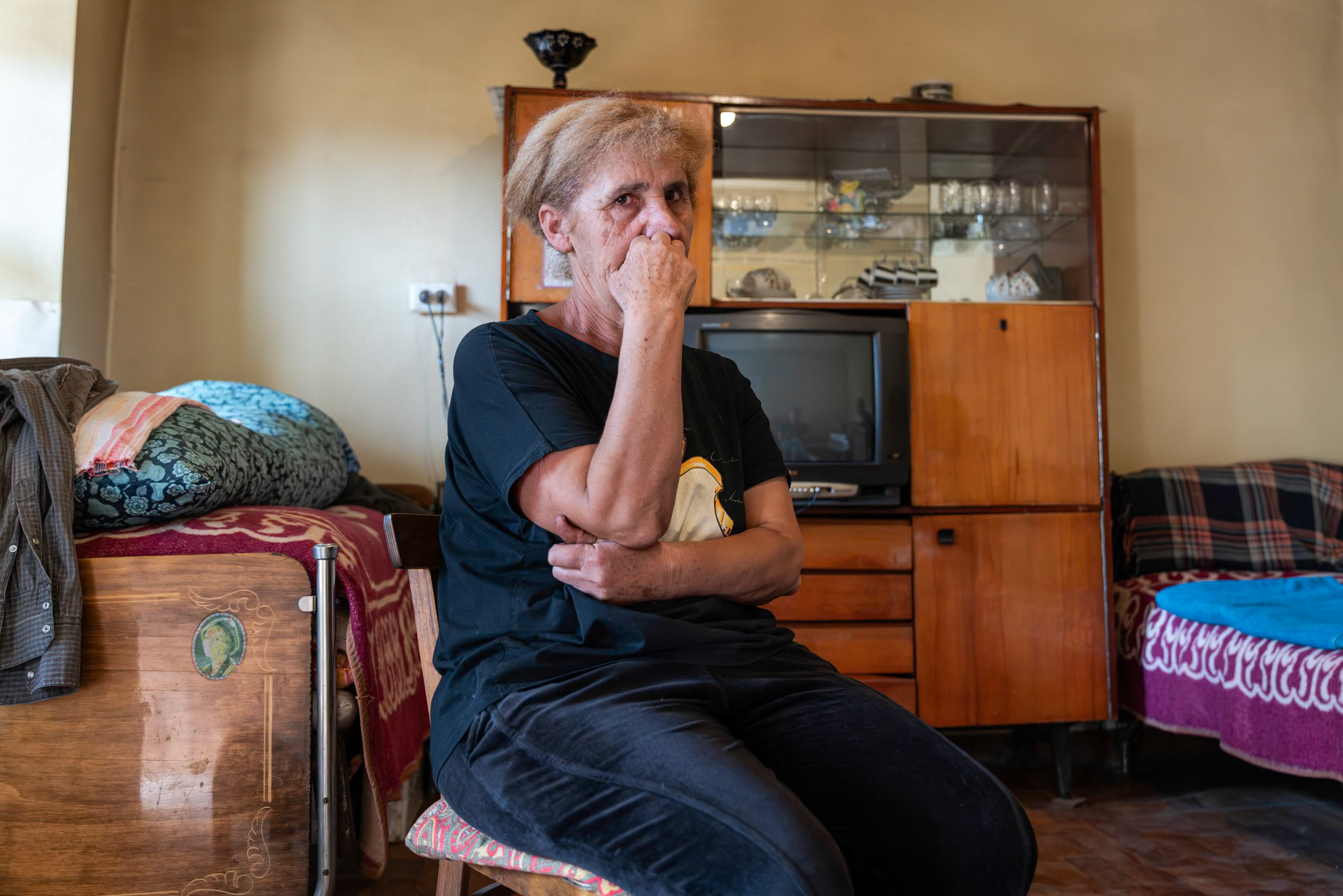 Zina, in her house in Khantsakh, a village on the new front line between Azerbaijan and Armenia since the 2020 Nagorno-Karabakh war. The residents of these border villages feel abandoned and left to fend for themselves, with very few public services available to them. Syunik, Armenia, September 2025