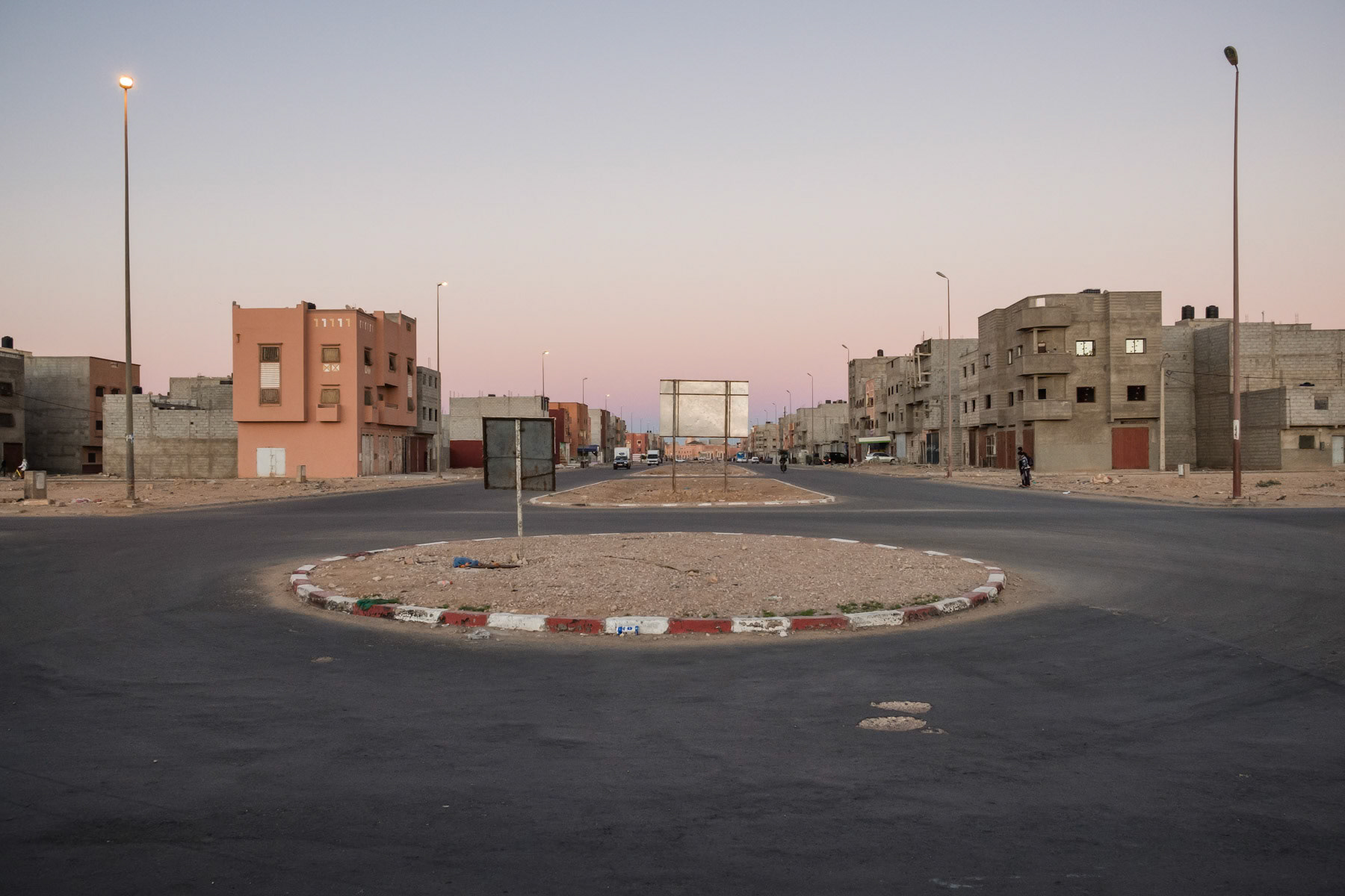 Rudimentary accomodation blocks built by the Moroccan authorities. The authorities try very hard to attrack Morrocans to settle in the disputed territory of the Western Sahara by building infrastructure and new neighbourhoods on the edge of the capital. Laayoune, Western Sahara, December 2018