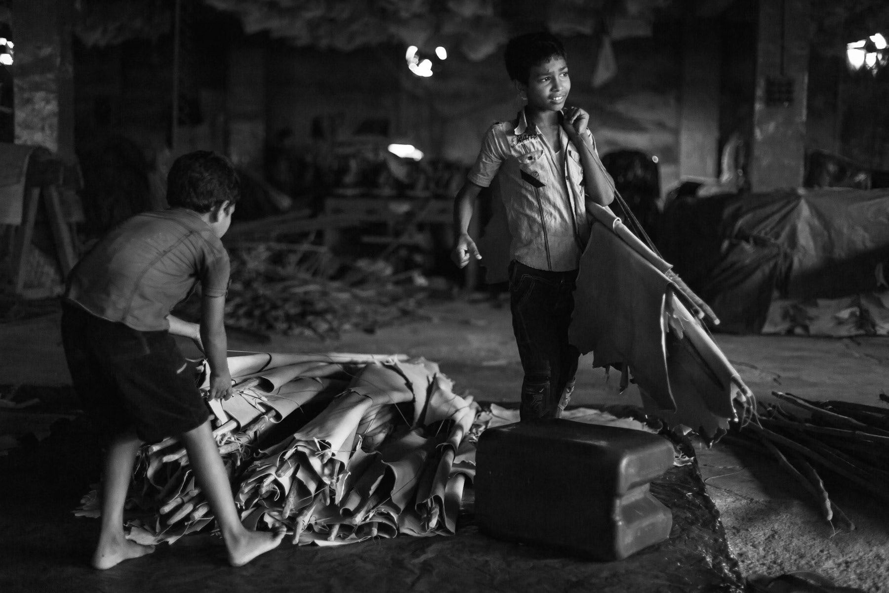 Children working in the skin drying space of the tannery, Hazaribagh, Bangladesh, May 2015